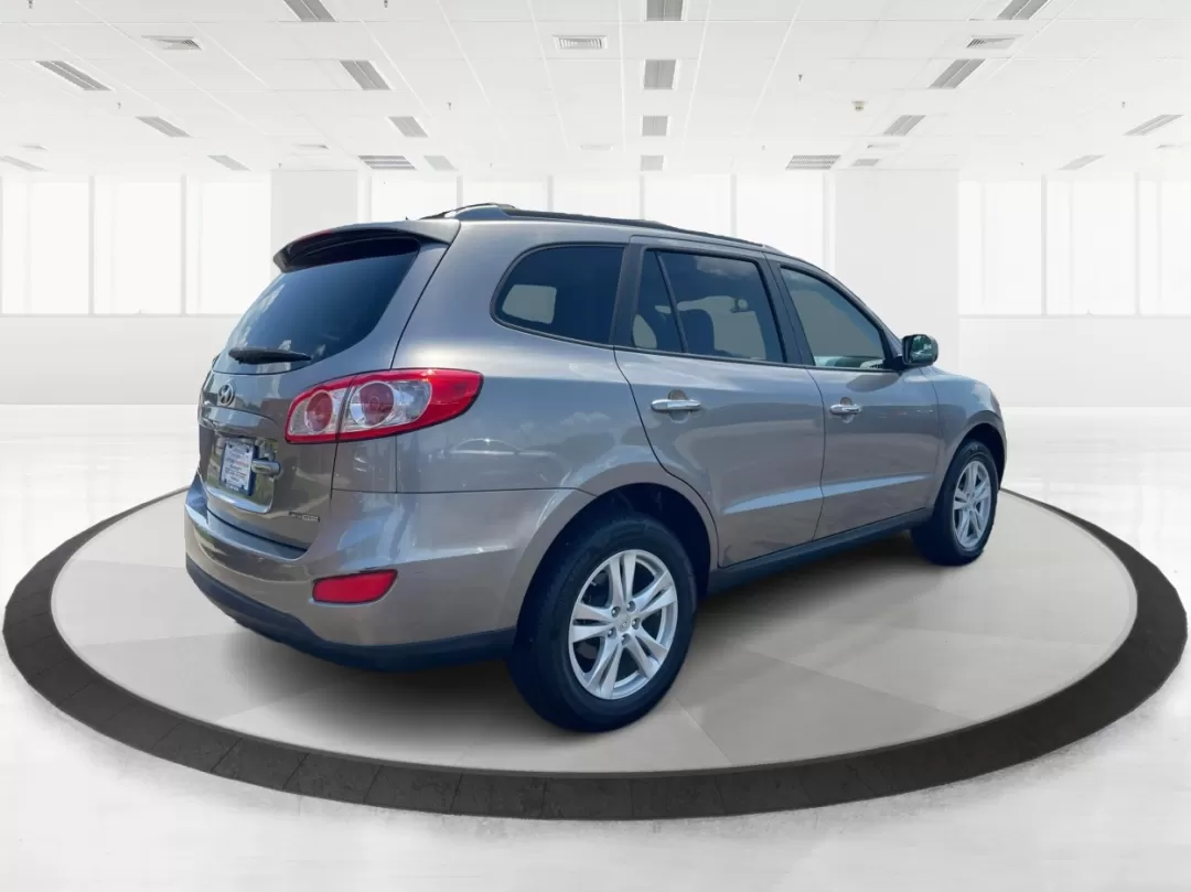 2012 Hyundai Santa Fe Limited V6 (5XYZKDAG0CG) with an 3.5L V-6 DOHC engine, located at 1184 Kauffman Ave, Fairborn, OH, 45324, (937) 908-9800, 39.807072, -84.030914 - **Elevate Your Adventures with the 2012 Hyundai Santa Fe Limited V6 at Advantage Car and Credit in Fairborn, OH!**<br /> <br /> Whether you're planning family road trips, tackling your daily commute, or seeking weekend adventures, the 2012 Hyundai Santa Fe Limited V6 is the perfect companion. With i - Photo#2