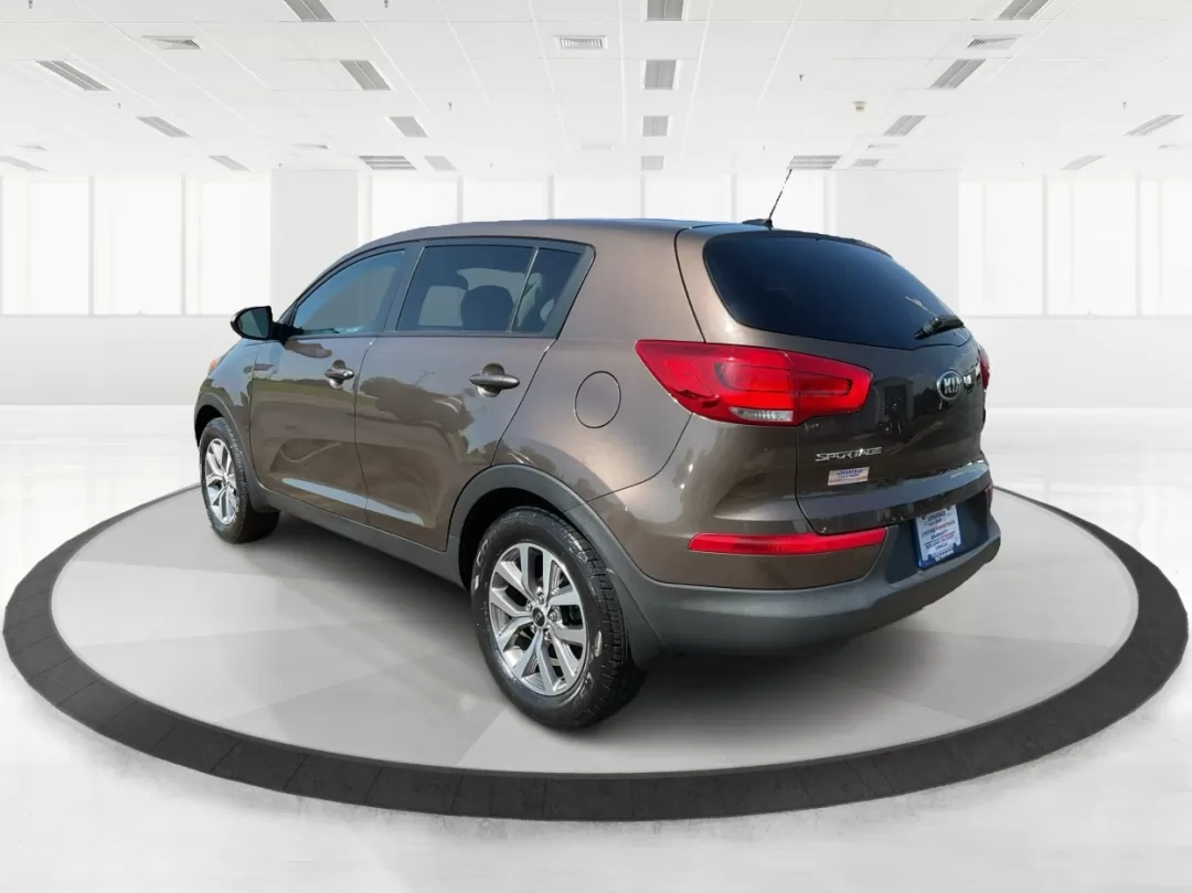 2015 Kia Sportage LX (KNDPB3AC3F7) with an Other engine, located at 1184 Kauffman Ave, Fairborn, OH, 45324, (937) 908-9800, 39.807072, -84.030914 - Experience the thrill of adventure in this 2015 Kia Sportage LX, perfectly crafted for growing families or weekend warriors seeking an exciting ride. With ample cargo space and a comfortable interior, this crossover is designed to elevate your lifestyle, whether it's school drop-offs, long commutes, - Photo#4