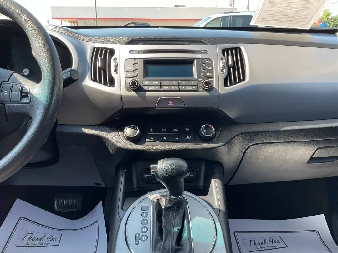 2015 Kia Sportage LX (KNDPB3AC3F7) with an Other engine, located at 1184 Kauffman Ave, Fairborn, OH, 45324, (937) 908-9800, 39.807072, -84.030914 - Experience the thrill of adventure in this 2015 Kia Sportage LX, perfectly crafted for growing families or weekend warriors seeking an exciting ride. With ample cargo space and a comfortable interior, this crossover is designed to elevate your lifestyle, whether it's school drop-offs, long commutes, - Photo#12
