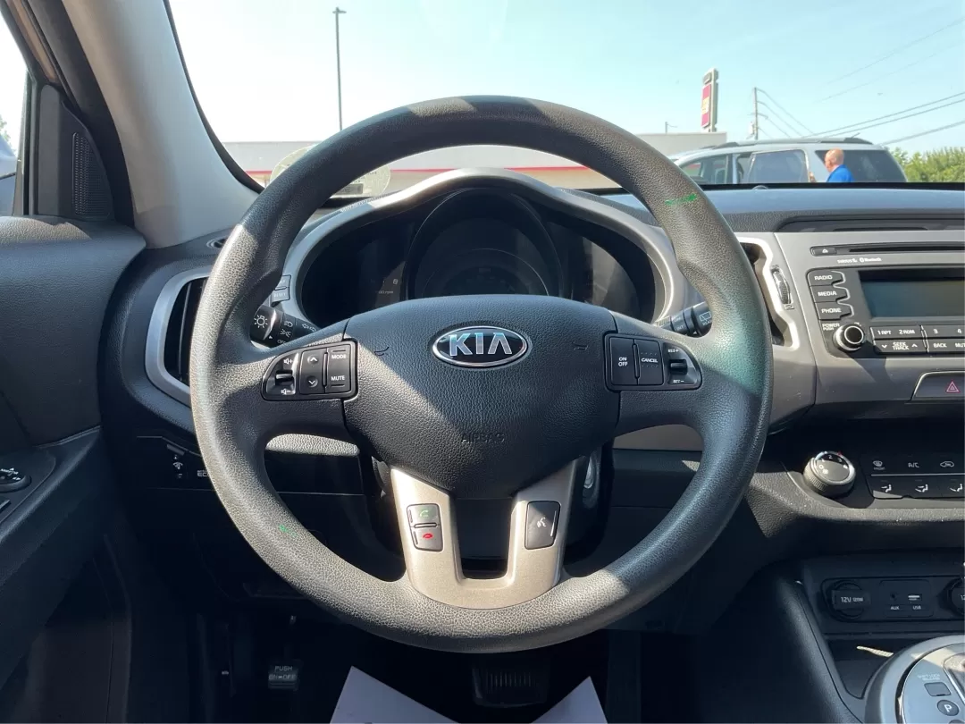 2015 Kia Sportage LX (KNDPB3AC3F7) with an Other engine, located at 1184 Kauffman Ave, Fairborn, OH, 45324, (937) 908-9800, 39.807072, -84.030914 - Experience the thrill of adventure in this 2015 Kia Sportage LX, perfectly crafted for growing families or weekend warriors seeking an exciting ride. With ample cargo space and a comfortable interior, this crossover is designed to elevate your lifestyle, whether it's school drop-offs, long commutes, - Photo#15