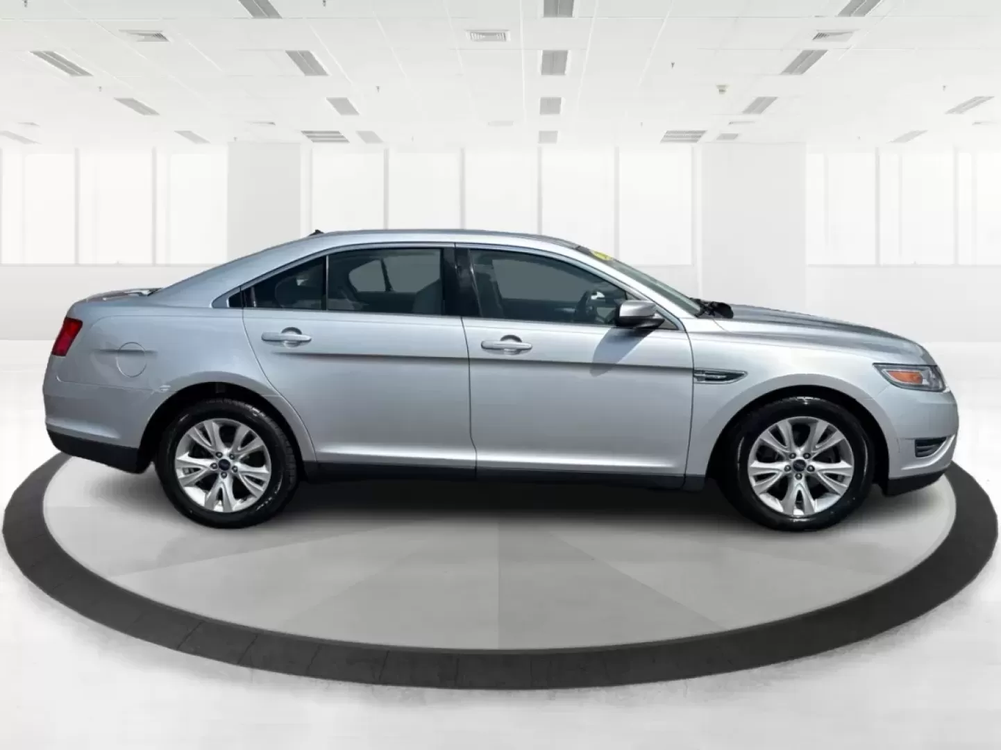 2011 Ford Taurus SEL (1FAHP2EW3BG) with an Duratec 3.5L V-6 DOHC engine, located at 880 E. National Road, Vandalia, OH, 45377, (937) 908-9800, 39.891918, -84.183594 - Experience the perfect blend of comfort, style, and reliability with the 2011 Ford Taurus SEL, a sedan that is truly designed for modern life. Whether you're commuting to work, transporting your growing family, or heading out for weekend adventures, this vehicle caters to a variety of lifestyles. Av - Photo#14