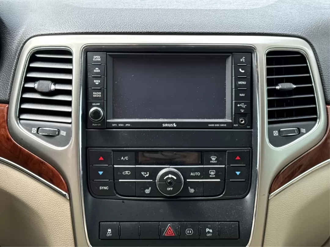 2012 Jeep Grand Cherokee Limited (1C4RJFBGXCC) with an Other engine, located at 401 Woodman Dr, Riverside, OH, 45431, (937) 908-9800, 39.760899, -84.123421 - **Discover Your Next Adventure with the 2012 Jeep Grand Cherokee Limited!**<br /> <br /> At Advantage Car and Credit, we believe that every journey begins with the right vehicle, especially for those who crave adventure. Whether you're navigating through the bustling streets of Fairborn, OH, or emba - Photo#12