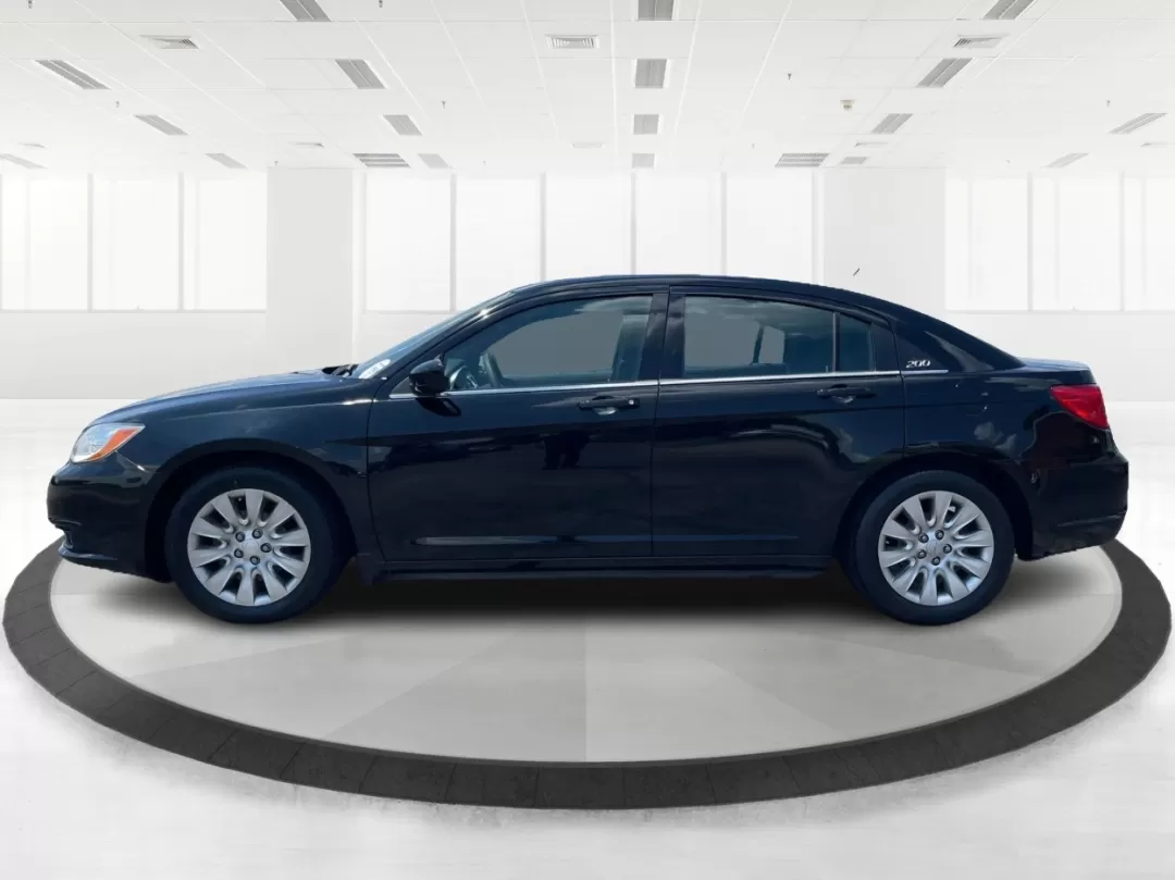 2014 Chrysler 200 LX (1C3CCBAG7EN) with an Other engine, located at 880 E. National Road, Vandalia, OH, 45377, (937) 908-9800, 39.891918, -84.183594 - Are you looking for a reliable car that seamlessly fits into your busy lifestyle? Look no further than this stunning 2014 Chrysler 200 LX, available now at Advantage Car and Credit in Fairborn, OH. This stylish sedan is perfect for growing families, daily commuters, or anyone seeking a dependable ve - Photo#5
