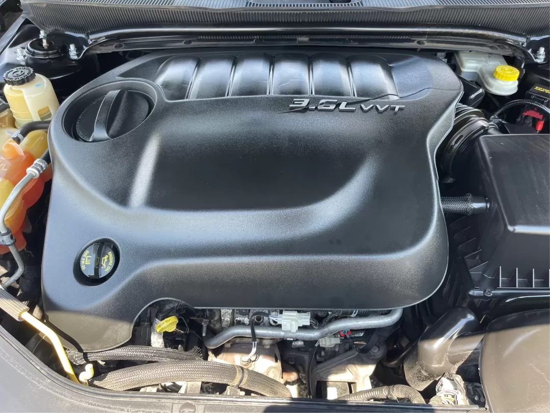 2014 Chrysler 200 LX (1C3CCBAG7EN) with an Other engine, located at 880 E. National Road, Vandalia, OH, 45377, (937) 908-9800, 39.891918, -84.183594 - Are you looking for a reliable car that seamlessly fits into your busy lifestyle? Look no further than this stunning 2014 Chrysler 200 LX, available now at Advantage Car and Credit in Fairborn, OH. This stylish sedan is perfect for growing families, daily commuters, or anyone seeking a dependable ve - Photo#10