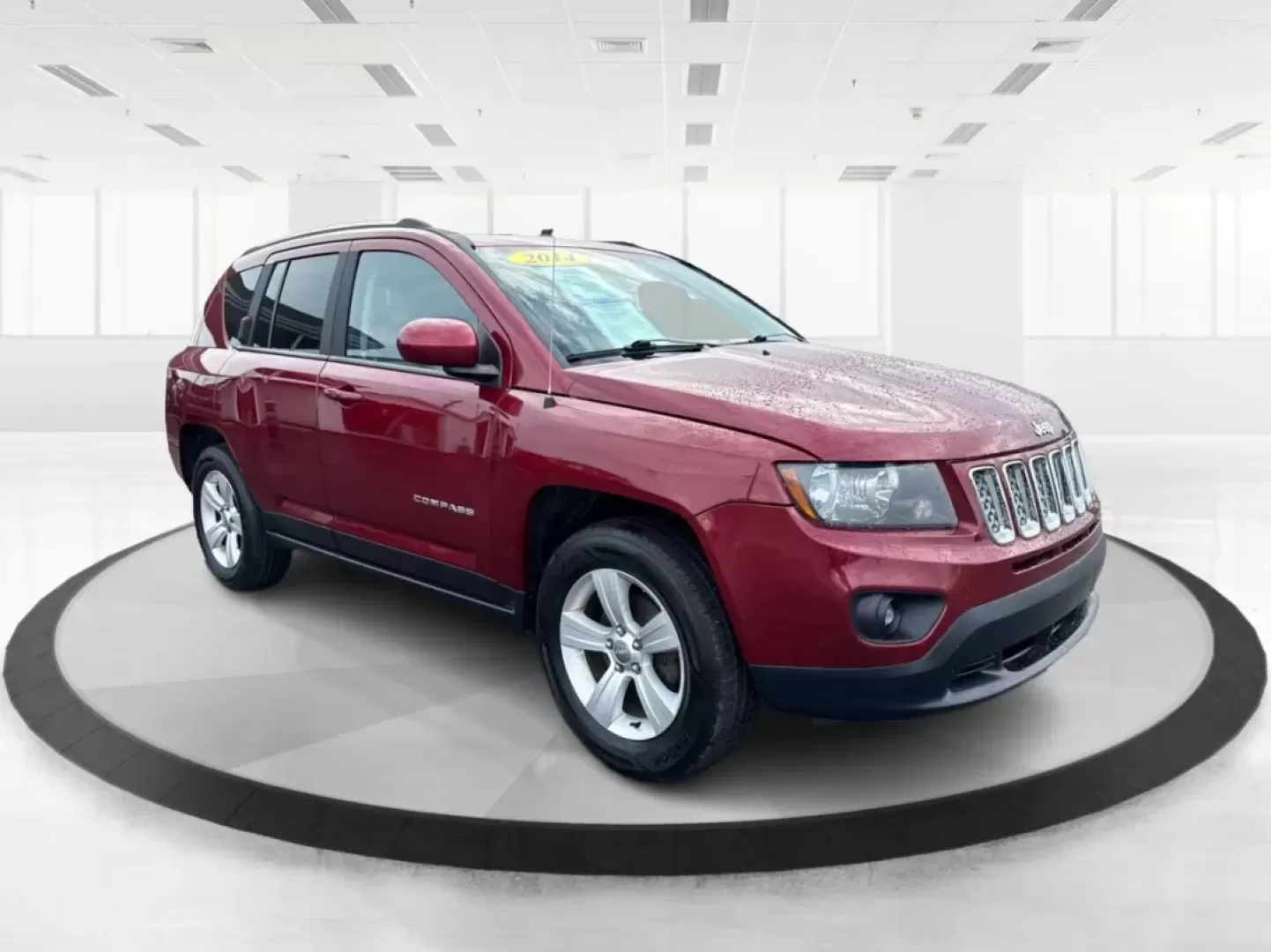 2014 Jeep Compass Latitude (1C4NJDEBXED) with an 2.4L I-4 DOHC engine, located at 8750 N County Rd 25A, Piqua, OH, 45356, (937) 908-9800, 40.164391, -84.232513 - **Discover Your Adventure with the 2014 Jeep Compass Latitude Perfect for Family Road Trips or Daily Commutes!**<br /> <br /> Are you ready to elevate your driving experience? The 2014 Jeep Compass Latitude is not just a vehicle; it's a lifestyle. Whether you're navigating busy city streets in Fair - Photo#0