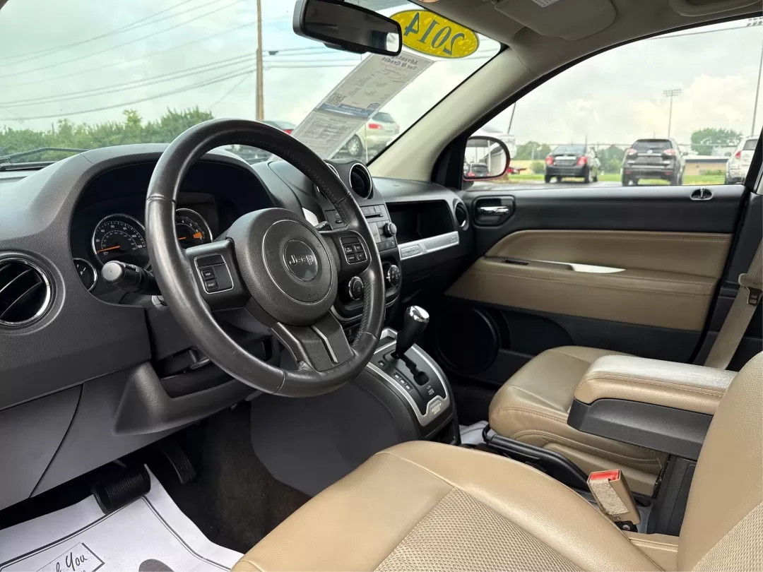 2014 Jeep Compass Latitude (1C4NJDEBXED) with an 2.4L I-4 DOHC engine, located at 8750 N County Rd 25A, Piqua, OH, 45356, (937) 908-9800, 40.164391, -84.232513 - **Discover Your Adventure with the 2014 Jeep Compass Latitude Perfect for Family Road Trips or Daily Commutes!**<br /> <br /> Are you ready to elevate your driving experience? The 2014 Jeep Compass Latitude is not just a vehicle; it's a lifestyle. Whether you're navigating busy city streets in Fair - Photo#8