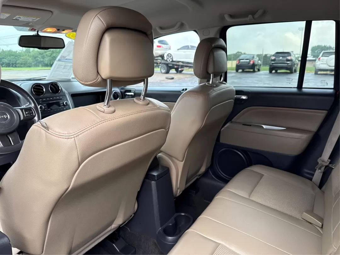 2014 Jeep Compass Latitude (1C4NJDEBXED) with an 2.4L I-4 DOHC engine, located at 8750 N County Rd 25A, Piqua, OH, 45356, (937) 908-9800, 40.164391, -84.232513 - **Discover Your Adventure with the 2014 Jeep Compass Latitude Perfect for Family Road Trips or Daily Commutes!**<br /> <br /> Are you ready to elevate your driving experience? The 2014 Jeep Compass Latitude is not just a vehicle; it's a lifestyle. Whether you're navigating busy city streets in Fair - Photo#9
