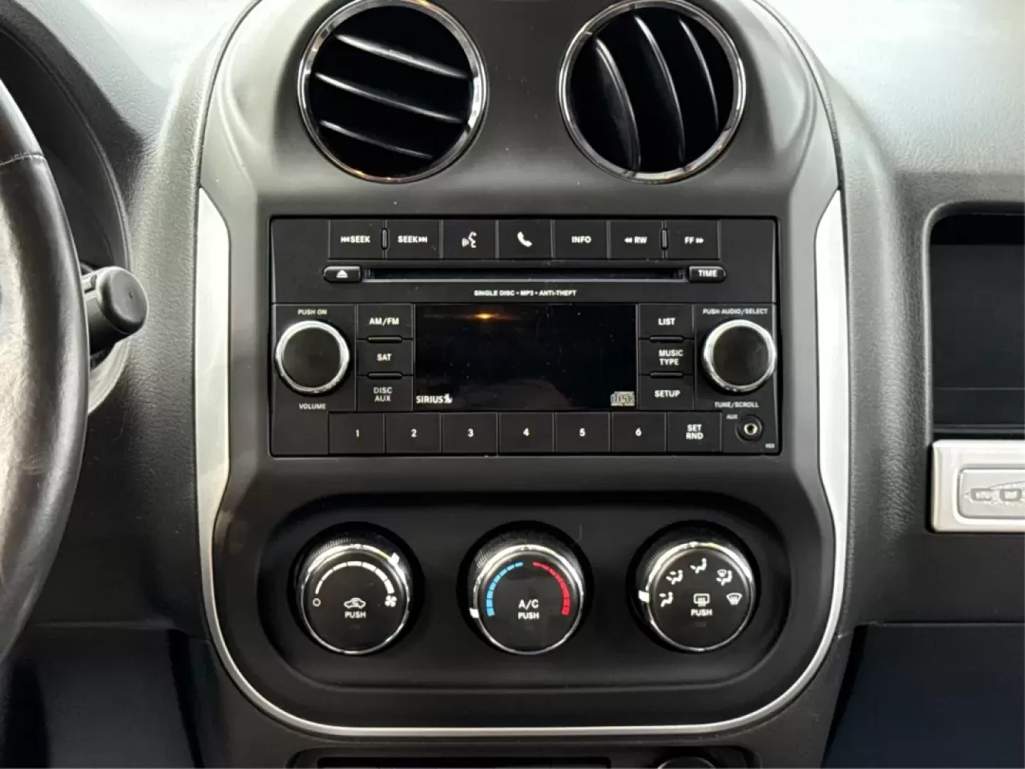 2014 Jeep Compass Latitude (1C4NJDEBXED) with an 2.4L I-4 DOHC engine, located at 8750 N County Rd 25A, Piqua, OH, 45356, (937) 908-9800, 40.164391, -84.232513 - **Discover Your Adventure with the 2014 Jeep Compass Latitude Perfect for Family Road Trips or Daily Commutes!**<br /> <br /> Are you ready to elevate your driving experience? The 2014 Jeep Compass Latitude is not just a vehicle; it's a lifestyle. Whether you're navigating busy city streets in Fair - Photo#12