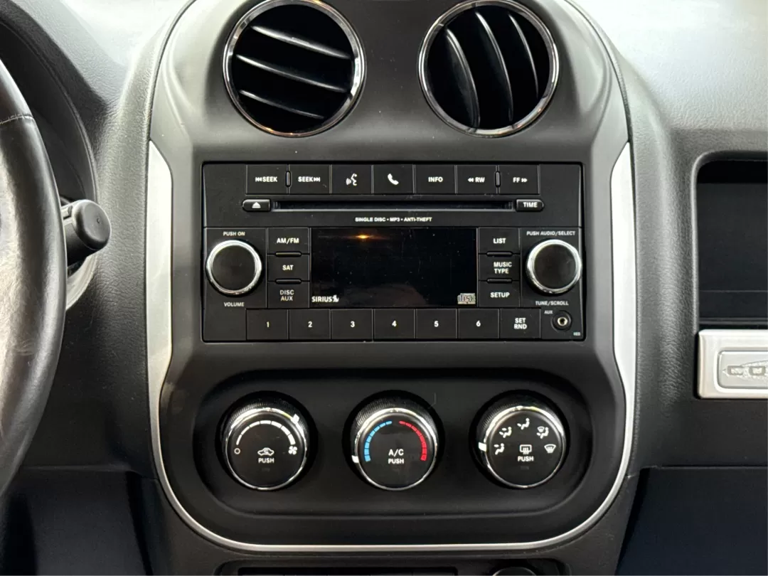 2014 Jeep Compass Latitude (1C4NJDEBXED) with an 2.4L I-4 DOHC engine, located at 8750 N County Rd 25A, Piqua, OH, 45356, (937) 908-9800, 40.164391, -84.232513 - **Discover Your Adventure with the 2014 Jeep Compass Latitude Perfect for Family Road Trips or Daily Commutes!**<br /> <br /> Are you ready to elevate your driving experience? The 2014 Jeep Compass Latitude is not just a vehicle; it's a lifestyle. Whether you're navigating busy city streets in Fair - Photo#12