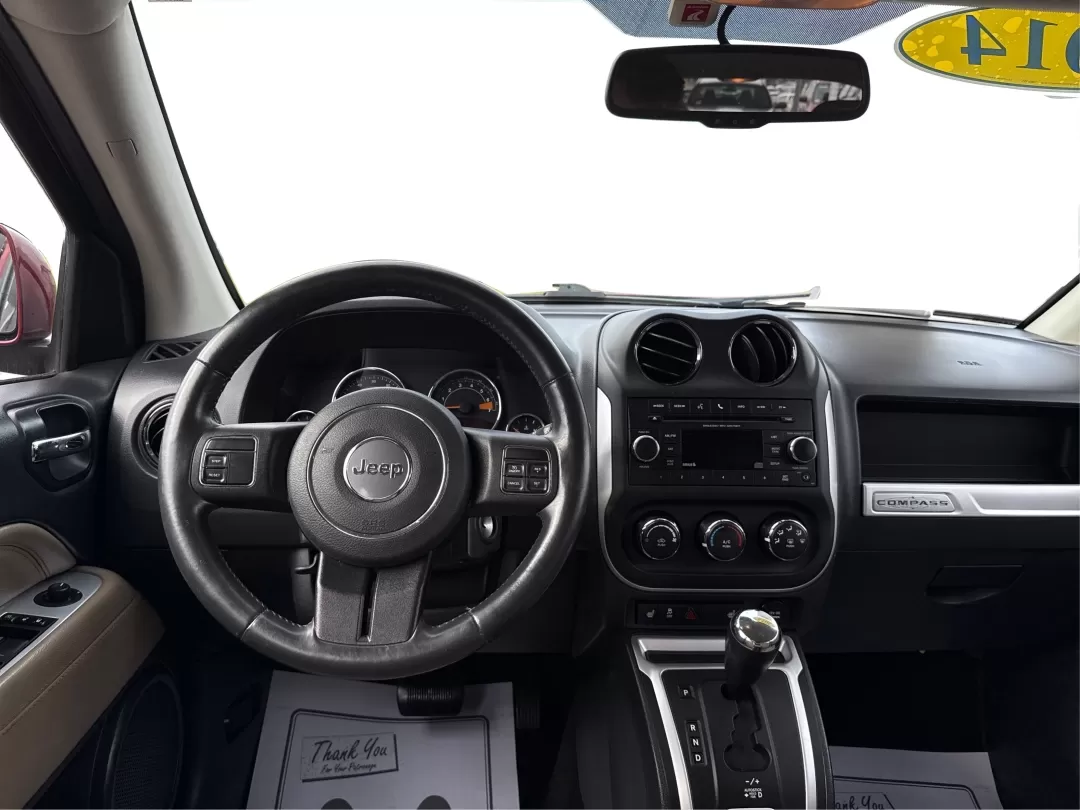 2014 Jeep Compass Latitude (1C4NJDEBXED) with an 2.4L I-4 DOHC engine, located at 8750 N County Rd 25A, Piqua, OH, 45356, (937) 908-9800, 40.164391, -84.232513 - **Discover Your Adventure with the 2014 Jeep Compass Latitude Perfect for Family Road Trips or Daily Commutes!**<br /> <br /> Are you ready to elevate your driving experience? The 2014 Jeep Compass Latitude is not just a vehicle; it's a lifestyle. Whether you're navigating busy city streets in Fair - Photo#20