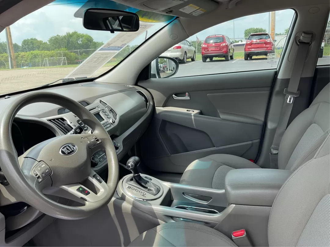 2014 Kia Sportage LX (KNDPBCAC6E7) with an Other engine, located at 8750 N County Rd 25A, Piqua, OH, 45356, (937) 908-9800, 40.164391, -84.232513 - **Adventure Awaits: 2014 Kia Sportage LX Ready for Your Next Journey!**<br /> <br /> Are you in search of a reliable vehicle that combines style, comfort, and versatility? Look no further than this 2014 Kia Sportage LX, perfect for weekend getaways, family road trips, or daily commutes. This crossov - Photo#7