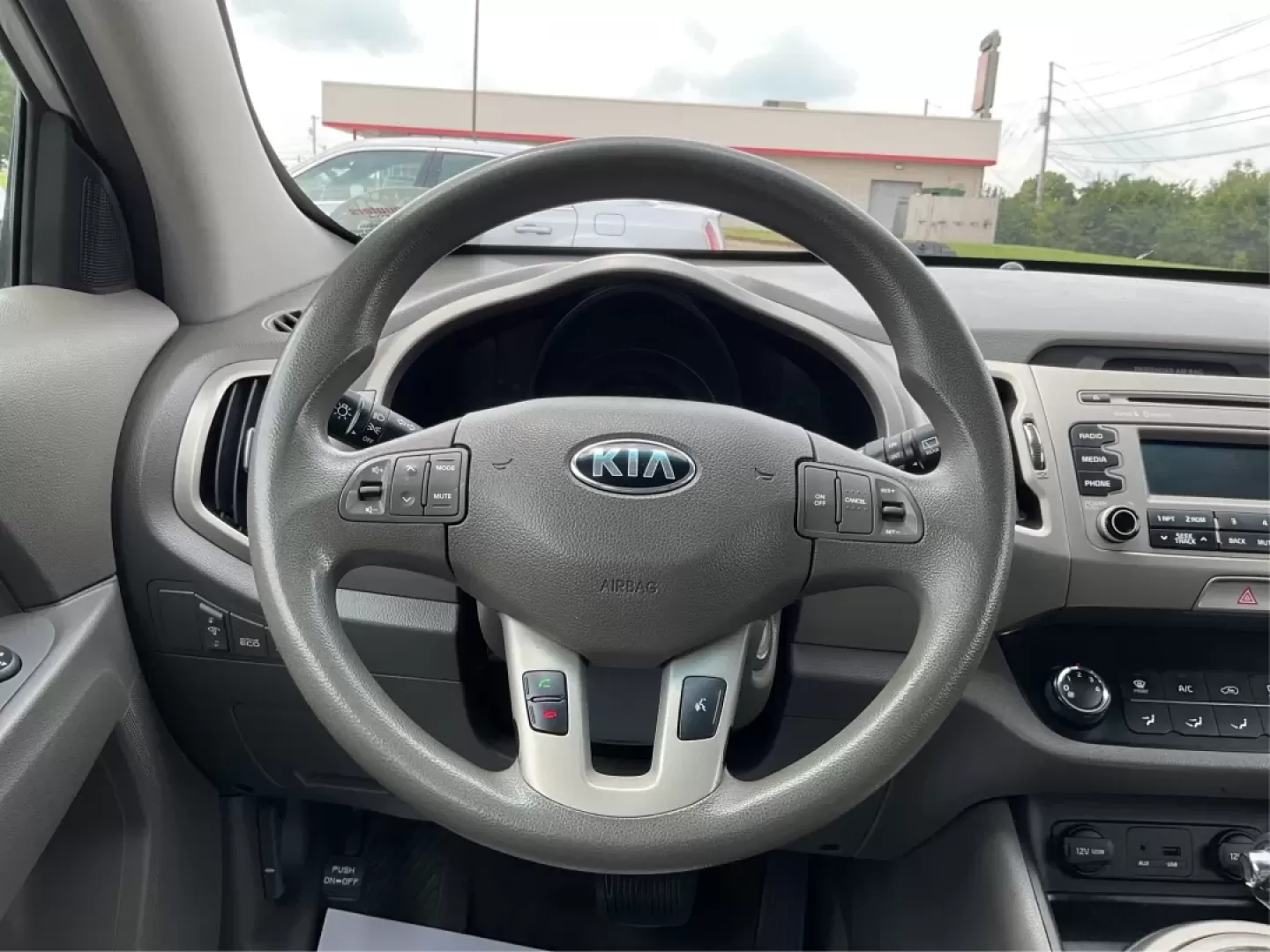 2014 Kia Sportage LX (KNDPBCAC6E7) with an Other engine, located at 8750 N County Rd 25A, Piqua, OH, 45356, (937) 908-9800, 40.164391, -84.232513 - Photo#14