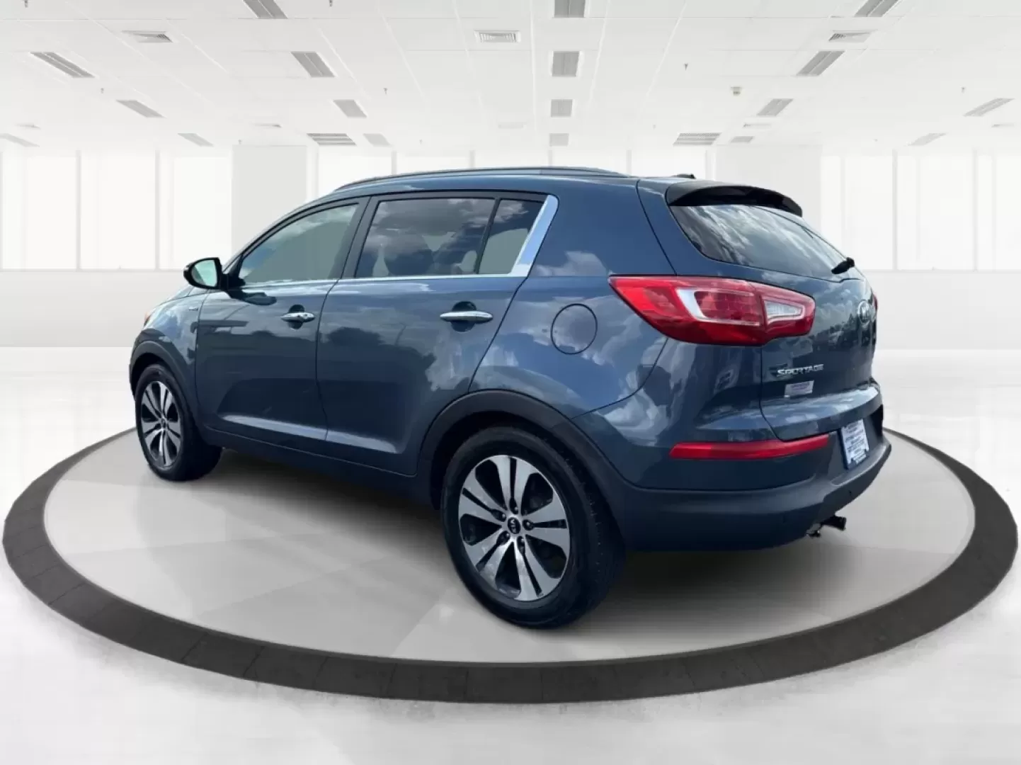 2013 Kia Sportage EX (KNDPCCA25D7) with an 2.4L I-4 DOHC engine, located at 1099 N County Rd 25A, Troy, OH, 45373, (937) 908-9800, 40.057079, -84.212883 - Photo#4