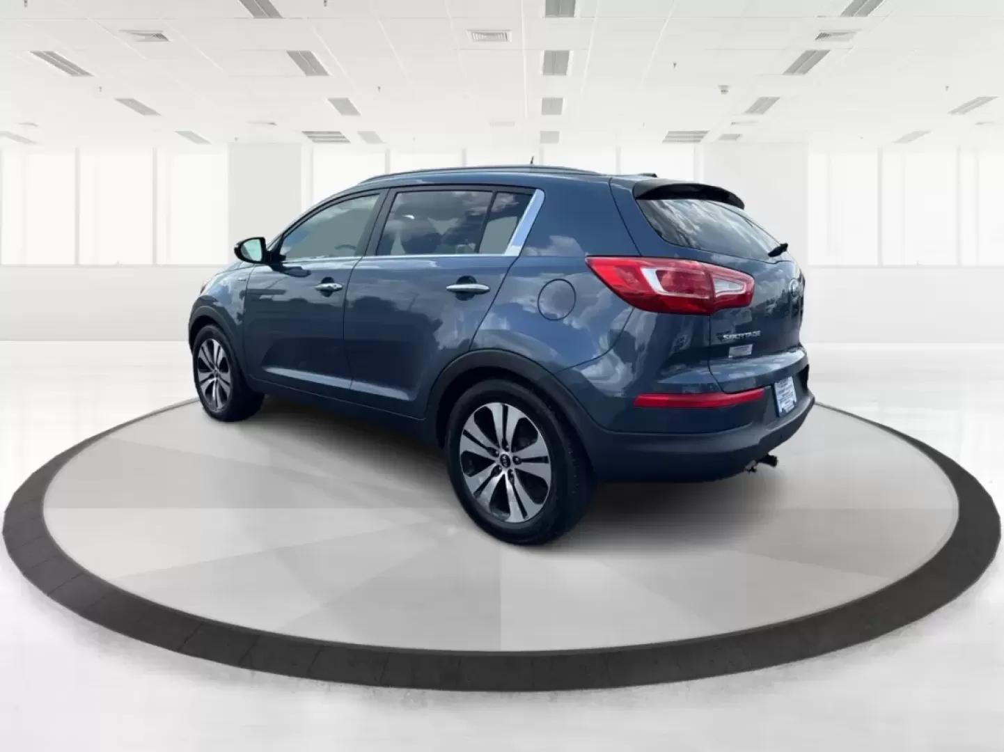 2013 Kia Sportage EX (KNDPCCA25D7) with an 2.4L I-4 DOHC engine, located at 1099 N County Rd 25A, Troy, OH, 45373, (937) 908-9800, 40.057079, -84.212883 - Photo#5