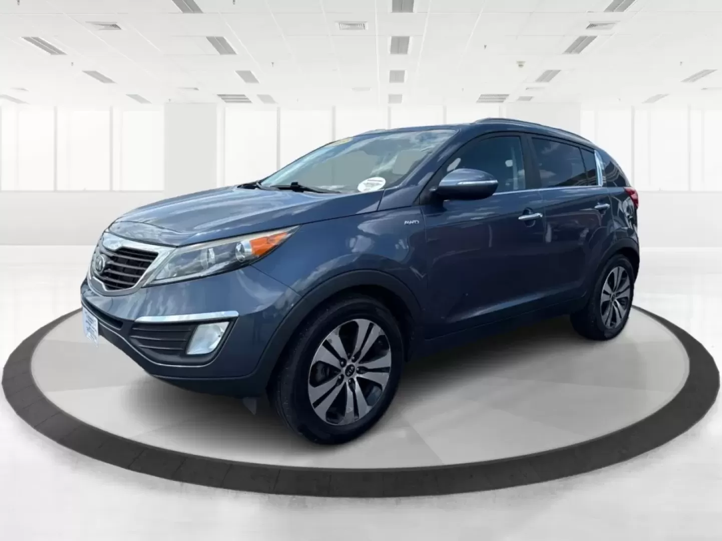 2013 Kia Sportage EX (KNDPCCA25D7) with an 2.4L I-4 DOHC engine, located at 1099 N County Rd 25A, Troy, OH, 45373, (937) 908-9800, 40.057079, -84.212883 - Photo#7