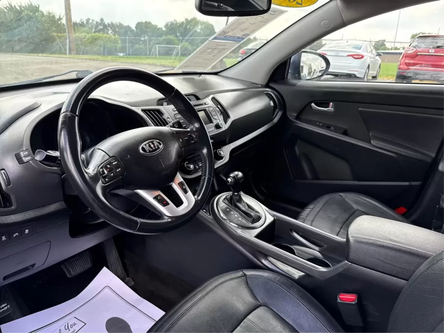 2013 Kia Sportage EX (KNDPCCA25D7) with an 2.4L I-4 DOHC engine, located at 1099 N County Rd 25A, Troy, OH, 45373, (937) 908-9800, 40.057079, -84.212883 - Photo#8