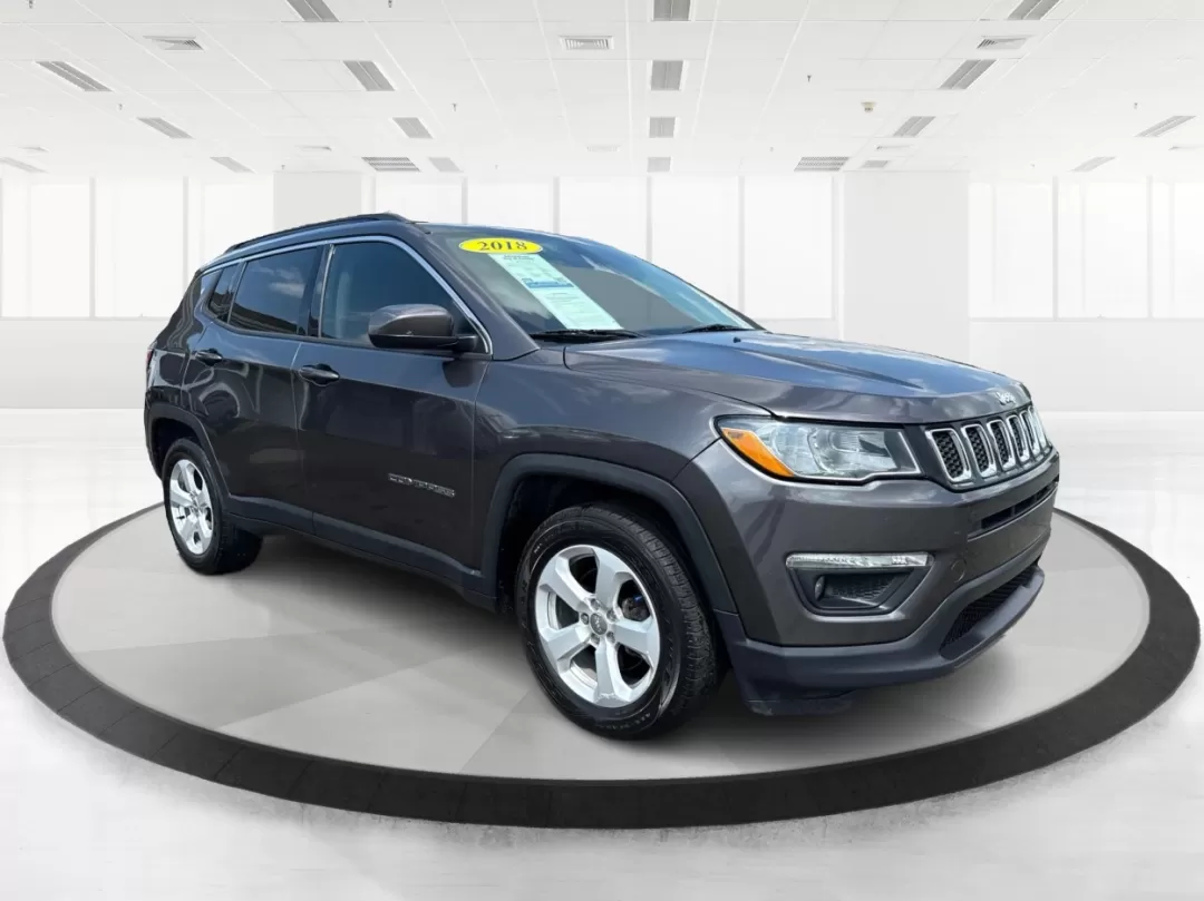 2018 Jeep Compass Latitude FWD (3C4NJCBB1JT) with an 2.4L I-4 variable valve control engine, located at 8750 N County Rd 25A, Piqua, OH, 45356, (937) 908-9800, 40.164391, -84.232513 - **Adventure Awaits with This 2018 Jeep Compass Latitude FWD!**<br /> <br /> Transform your everyday travels into unforgettable adventures with the 2018 Jeep Compass Latitude FWD. This SUV is not just a mode of transportation; it's your ticket to exploration, whether it's cruising through the scenic - Photo#0