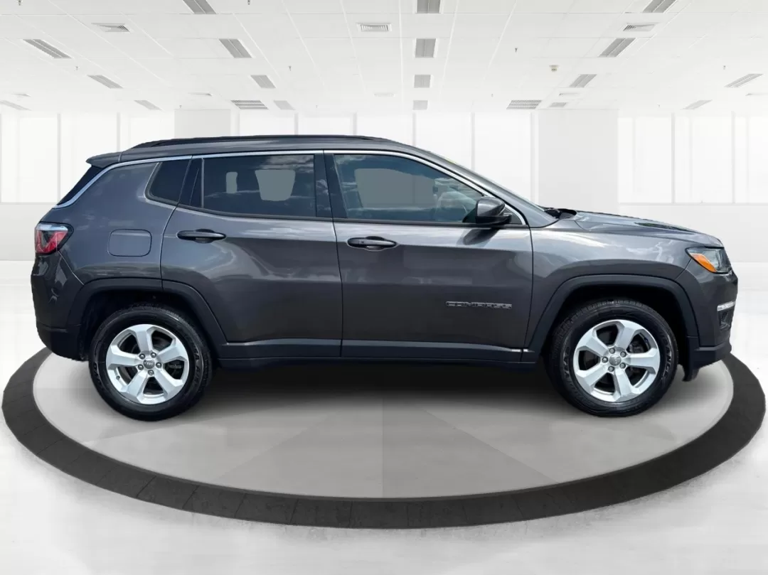 2018 Jeep Compass Latitude FWD (3C4NJCBB1JT) with an 2.4L I-4 variable valve control engine, located at 8750 N County Rd 25A, Piqua, OH, 45356, (937) 908-9800, 40.164391, -84.232513 - **Adventure Awaits with This 2018 Jeep Compass Latitude FWD!**<br /> <br /> Transform your everyday travels into unforgettable adventures with the 2018 Jeep Compass Latitude FWD. This SUV is not just a mode of transportation; it's your ticket to exploration, whether it's cruising through the scenic - Photo#1