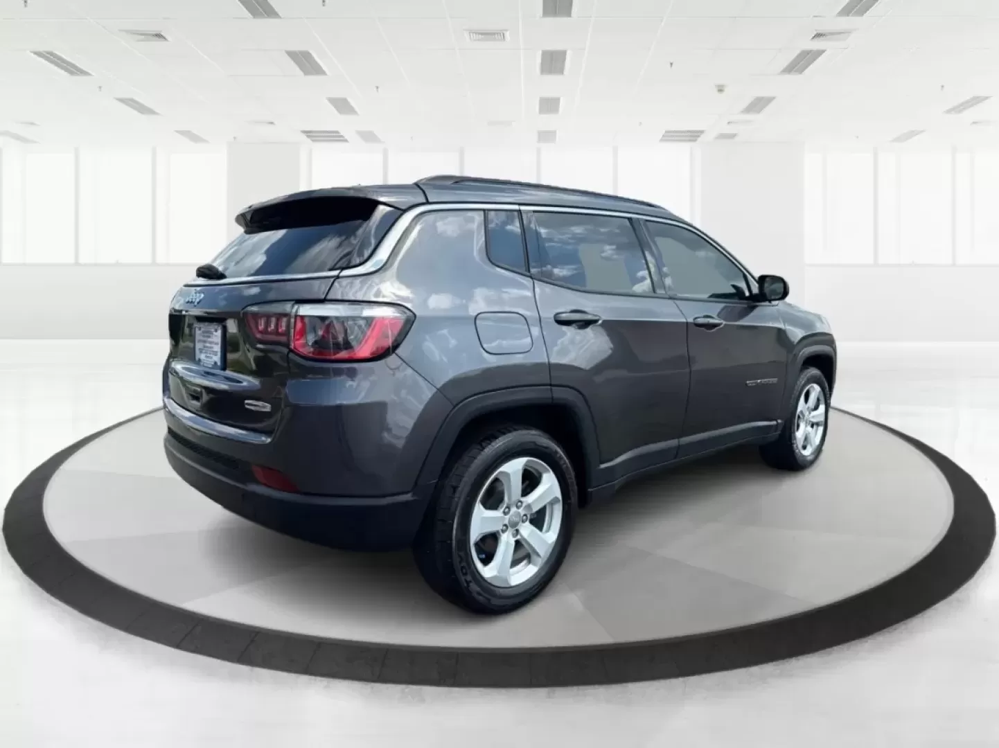 2018 Jeep Compass Latitude FWD (3C4NJCBB1JT) with an 2.4L I-4 variable valve control engine, located at 8750 N County Rd 25A, Piqua, OH, 45356, (937) 908-9800, 40.164391, -84.232513 - Photo#2