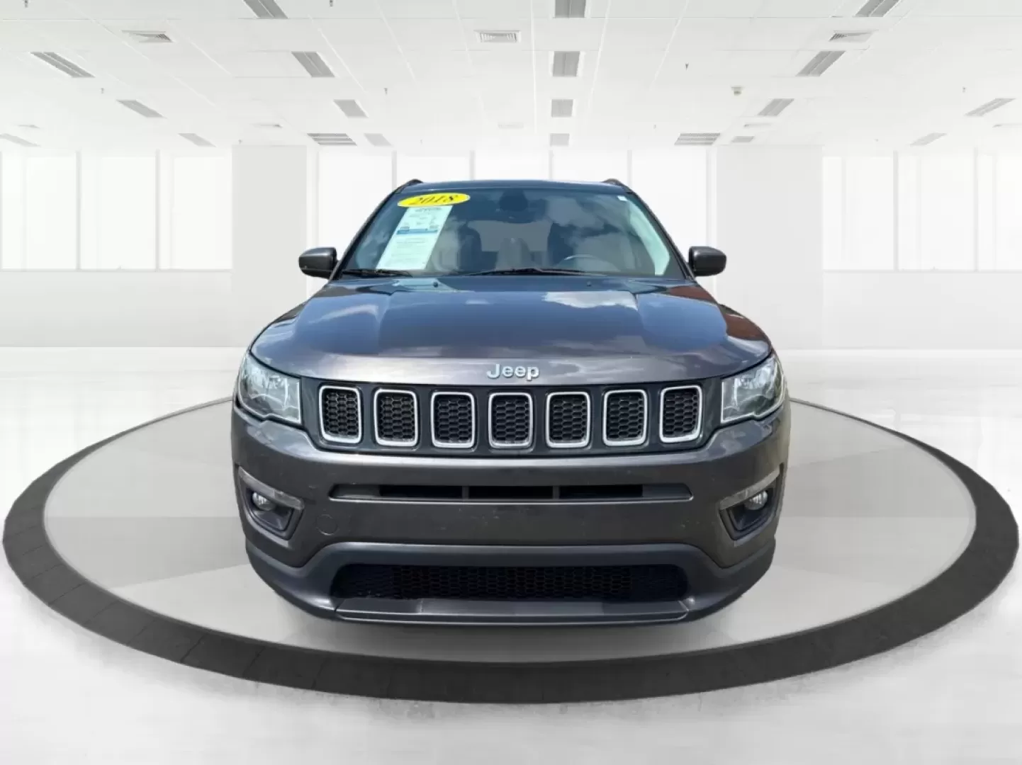 2018 Jeep Compass Latitude FWD (3C4NJCBB1JT) with an 2.4L I-4 variable valve control engine, located at 8750 N County Rd 25A, Piqua, OH, 45356, (937) 908-9800, 40.164391, -84.232513 - Photo#6