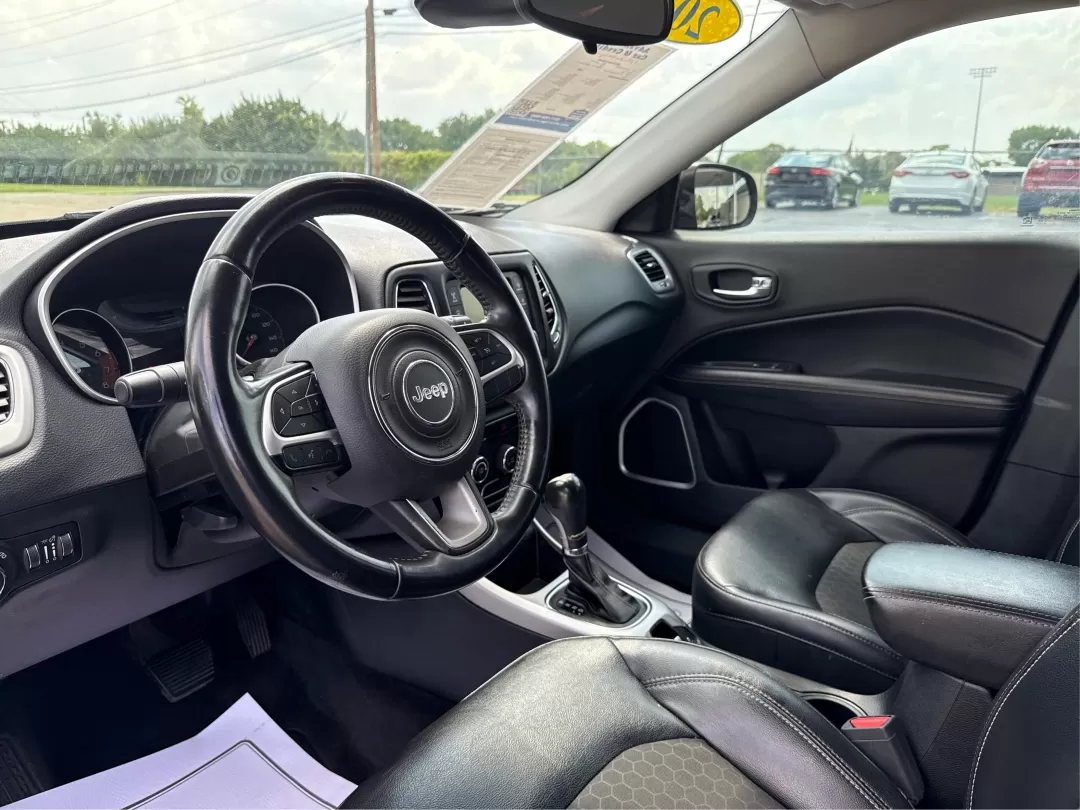 2018 Jeep Compass Latitude FWD (3C4NJCBB1JT) with an 2.4L I-4 variable valve control engine, located at 8750 N County Rd 25A, Piqua, OH, 45356, (937) 908-9800, 40.164391, -84.232513 - **Adventure Awaits with This 2018 Jeep Compass Latitude FWD!**<br /> <br /> Transform your everyday travels into unforgettable adventures with the 2018 Jeep Compass Latitude FWD. This SUV is not just a mode of transportation; it's your ticket to exploration, whether it's cruising through the scenic - Photo#8