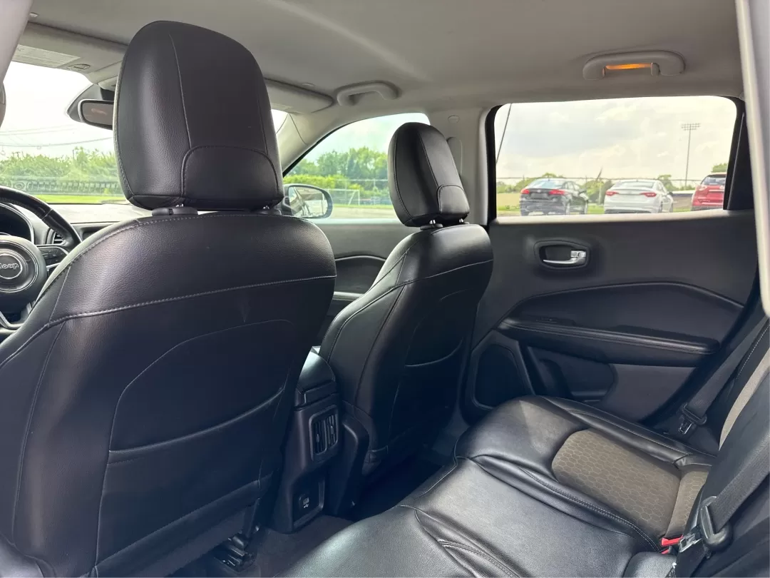 2018 Jeep Compass Latitude FWD (3C4NJCBB1JT) with an 2.4L I-4 variable valve control engine, located at 8750 N County Rd 25A, Piqua, OH, 45356, (937) 908-9800, 40.164391, -84.232513 - **Adventure Awaits with This 2018 Jeep Compass Latitude FWD!**<br /> <br /> Transform your everyday travels into unforgettable adventures with the 2018 Jeep Compass Latitude FWD. This SUV is not just a mode of transportation; it's your ticket to exploration, whether it's cruising through the scenic - Photo#9
