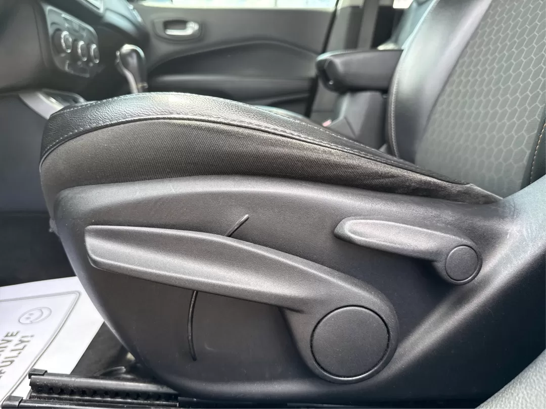 2018 Jeep Compass Latitude FWD (3C4NJCBB1JT) with an 2.4L I-4 variable valve control engine, located at 8750 N County Rd 25A, Piqua, OH, 45356, (937) 908-9800, 40.164391, -84.232513 - **Adventure Awaits with This 2018 Jeep Compass Latitude FWD!**<br /> <br /> Transform your everyday travels into unforgettable adventures with the 2018 Jeep Compass Latitude FWD. This SUV is not just a mode of transportation; it's your ticket to exploration, whether it's cruising through the scenic - Photo#17