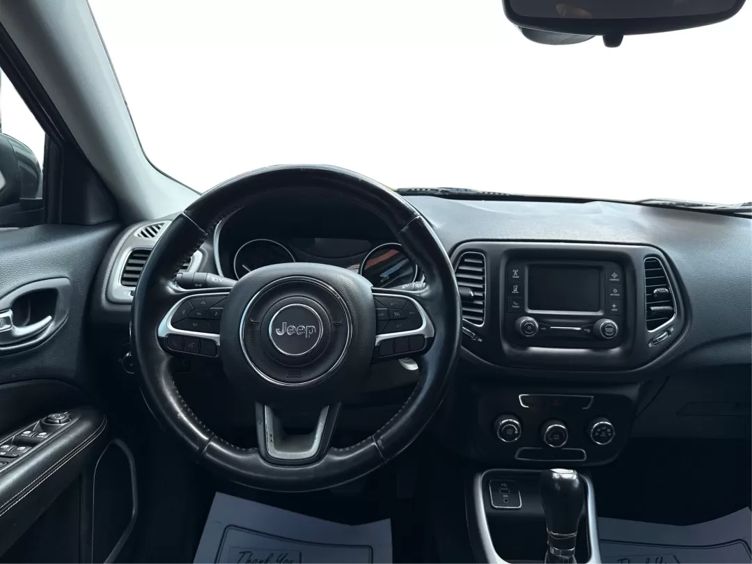 2018 Jeep Compass Latitude FWD (3C4NJCBB1JT) with an 2.4L I-4 variable valve control engine, located at 8750 N County Rd 25A, Piqua, OH, 45356, (937) 908-9800, 40.164391, -84.232513 - **Adventure Awaits with This 2018 Jeep Compass Latitude FWD!**<br /> <br /> Transform your everyday travels into unforgettable adventures with the 2018 Jeep Compass Latitude FWD. This SUV is not just a mode of transportation; it's your ticket to exploration, whether it's cruising through the scenic - Photo#20