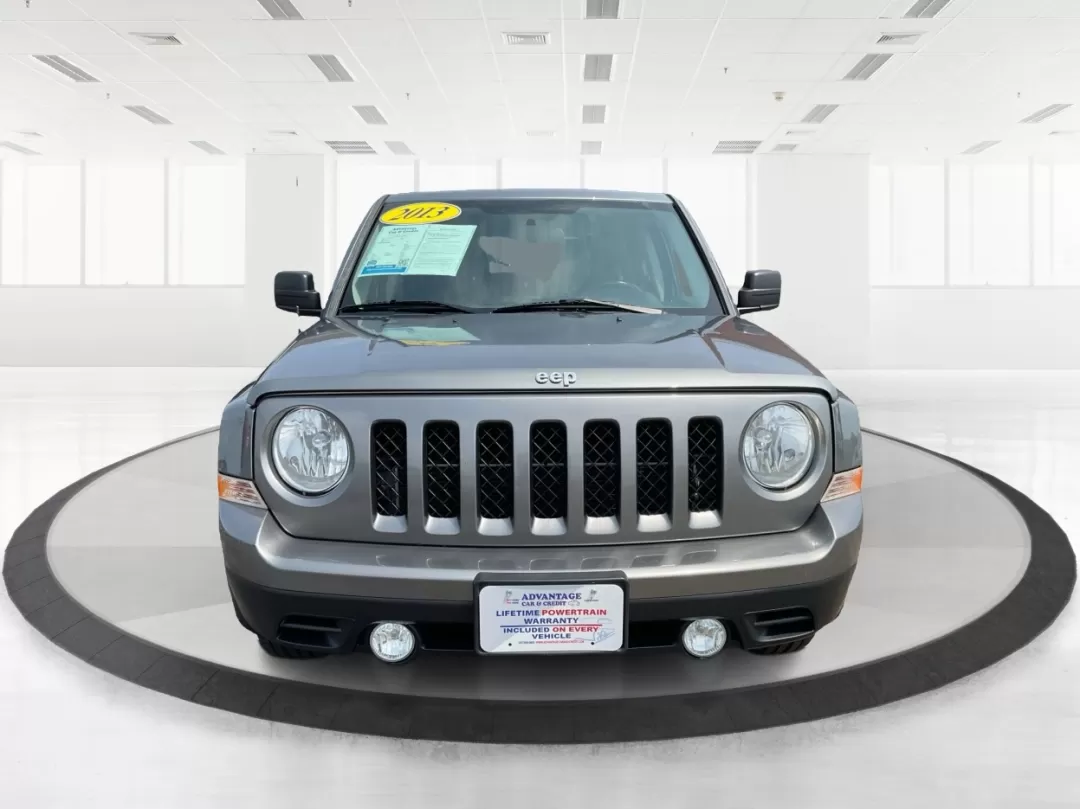 2013 Jeep Patriot Latitude (1C4NJPFA8DD) with an Other engine, located at 1951 S Dayton Lakeview Rd., New Carlisle, OH, 45344, (937) 908-9800, 39.890999, -84.050255 - Ready to elevate your adventures? Meet the 2013 Jeep Patriot Latitude, a versatile SUV that perfectly balances rugged capability with everyday comfort. Whether you're navigating the bustling streets of Fairborn, OH, or heading out for a weekend getaway to the scenic parks nearby, this vehicle is des - Photo#6