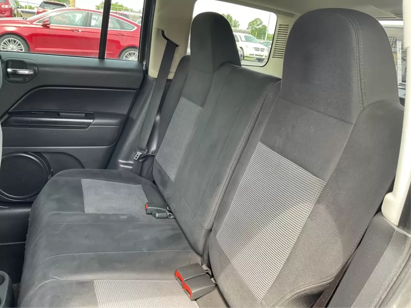 2013 Jeep Patriot Latitude (1C4NJPFA8DD) with an Other engine, located at 1951 S Dayton Lakeview Rd., New Carlisle, OH, 45344, (937) 908-9800, 39.890999, -84.050255 - Ready to elevate your adventures? Meet the 2013 Jeep Patriot Latitude, a versatile SUV that perfectly balances rugged capability with everyday comfort. Whether you're navigating the bustling streets of Fairborn, OH, or heading out for a weekend getaway to the scenic parks nearby, this vehicle is des - Photo#9