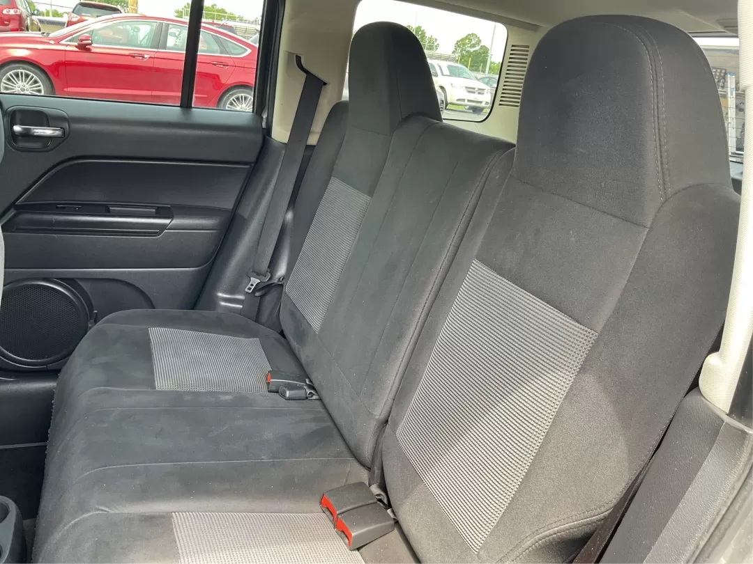 2013 Jeep Patriot Latitude (1C4NJPFA8DD) with an Other engine, located at 1951 S Dayton Lakeview Rd., New Carlisle, OH, 45344, (937) 908-9800, 39.890999, -84.050255 - Ready to elevate your adventures? Meet the 2013 Jeep Patriot Latitude, a versatile SUV that perfectly balances rugged capability with everyday comfort. Whether you're navigating the bustling streets of Fairborn, OH, or heading out for a weekend getaway to the scenic parks nearby, this vehicle is des - Photo#9