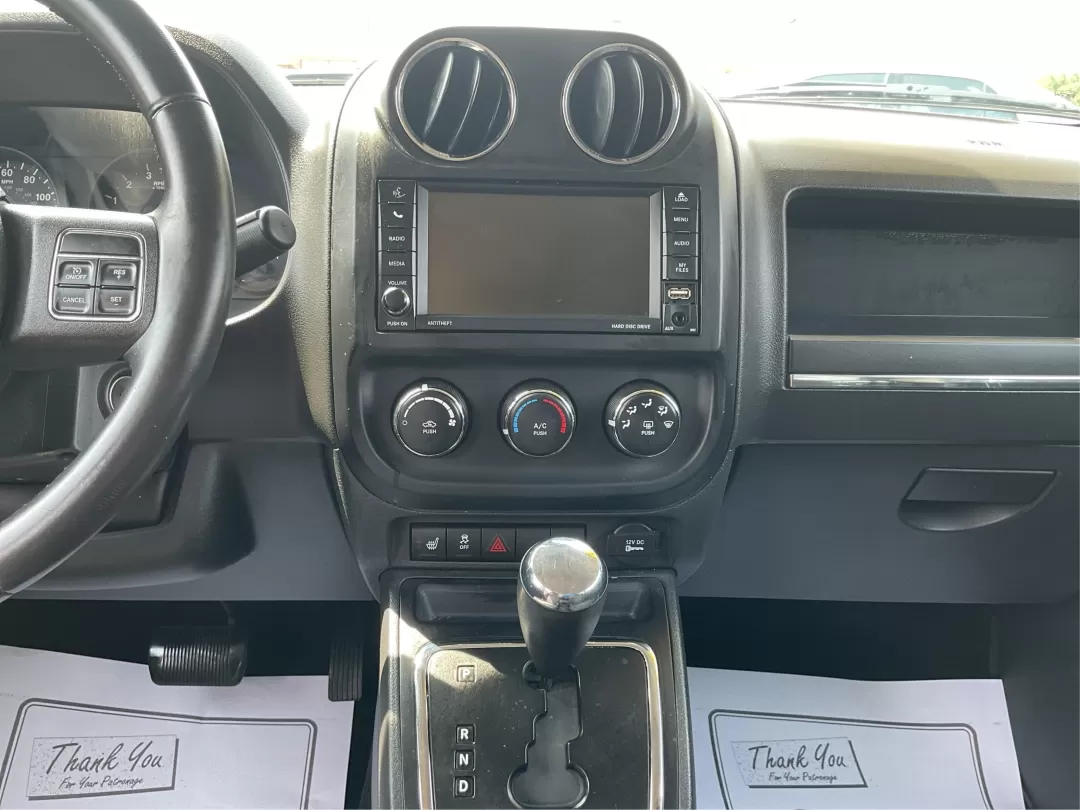 2013 Jeep Patriot Latitude (1C4NJPFA8DD) with an Other engine, located at 1951 S Dayton Lakeview Rd., New Carlisle, OH, 45344, (937) 908-9800, 39.890999, -84.050255 - Ready to elevate your adventures? Meet the 2013 Jeep Patriot Latitude, a versatile SUV that perfectly balances rugged capability with everyday comfort. Whether you're navigating the bustling streets of Fairborn, OH, or heading out for a weekend getaway to the scenic parks nearby, this vehicle is des - Photo#12