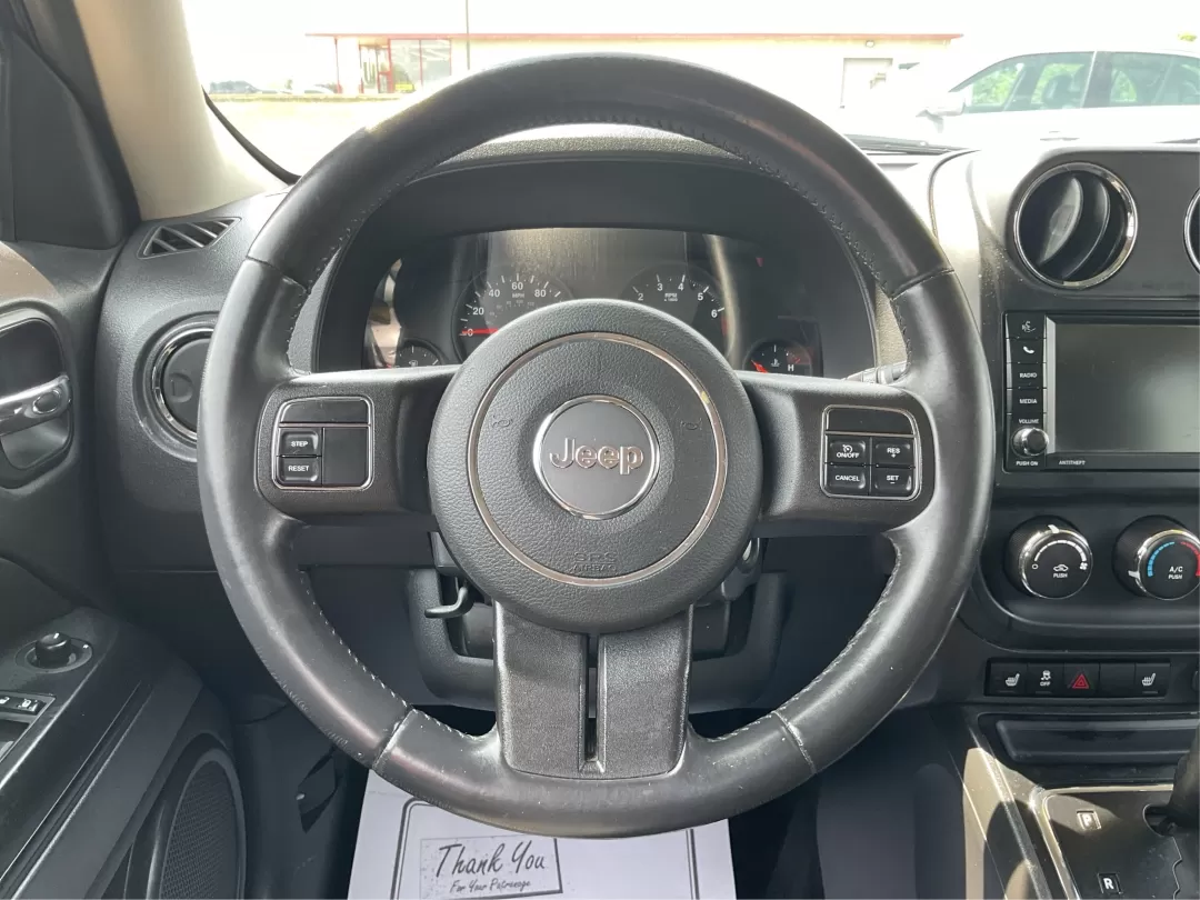 2013 Jeep Patriot Latitude (1C4NJPFA8DD) with an Other engine, located at 1951 S Dayton Lakeview Rd., New Carlisle, OH, 45344, (937) 908-9800, 39.890999, -84.050255 - Ready to elevate your adventures? Meet the 2013 Jeep Patriot Latitude, a versatile SUV that perfectly balances rugged capability with everyday comfort. Whether you're navigating the bustling streets of Fairborn, OH, or heading out for a weekend getaway to the scenic parks nearby, this vehicle is des - Photo#15