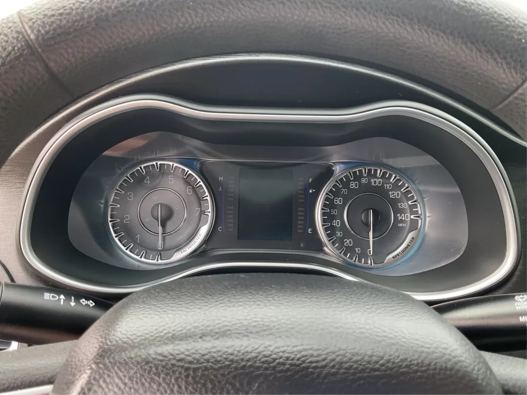 2015 Chrysler 200 Limited (1C3CCCAB1FN) with an Other engine, located at 1099 N County Rd 25A , Troy, OH, 45373, (937) 908-9800, 40.057079, -84.212883 - **Explore the Open Road with Comfort and Style in a 2015 Chrysler 200 Limited** <br /> <br /> Are you ready to elevate your daily commutes or weekend getaways? This 2015 Chrysler 200 Limited, available at Advantage Car and Credit in Fairborn, OH, is the perfect sedan for both city driving and long t - Photo#14