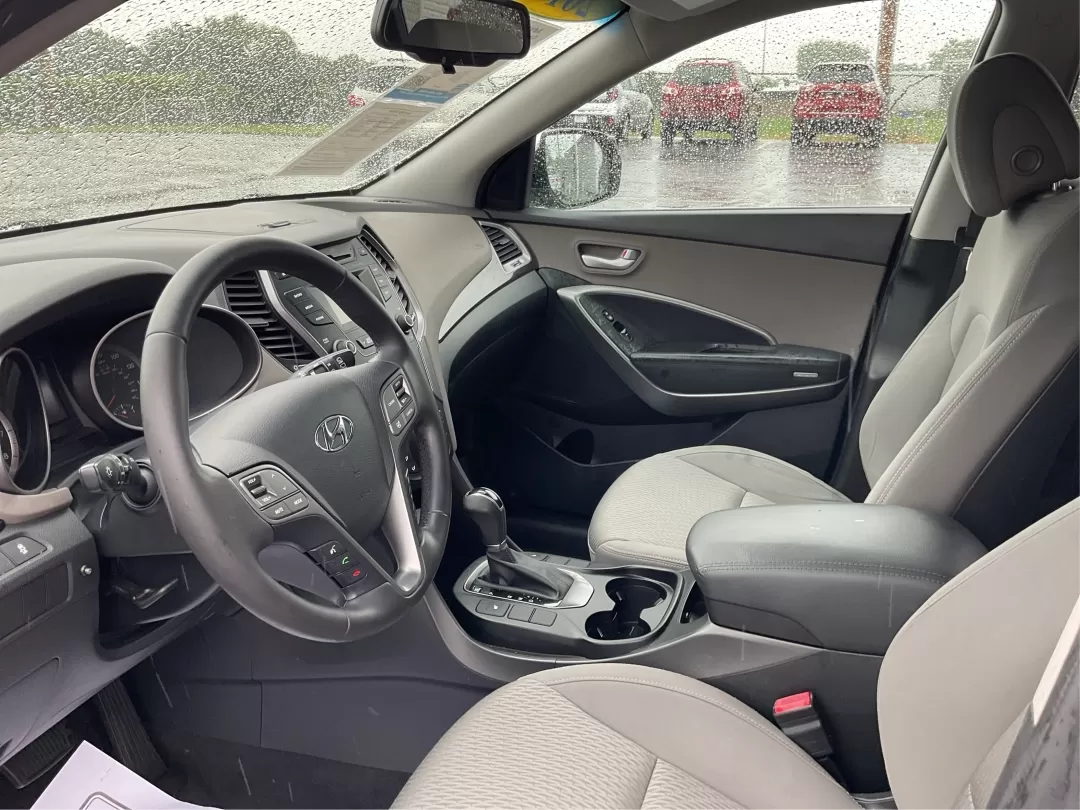 2014 Hyundai Santa Fe GLS (KM8SM4HF5EU) with an Lambda II 3.3L V-6 gasoline direct injection engine, located at 8750 N County Rd 25A, Piqua, OH, 45356, (937) 908-9800, 40.164391, -84.232513 - Looking for the perfect SUV to complement your busy lifestyle? Look no further than the 2014 Hyundai Santa Fe GLS, a vehicle designed for families, adventurers, and commuters alike. This reliable SUV, available at Advantage Car and Credit in Fairborn, OH, provides ample space, comfort, and modern fe - Photo#8