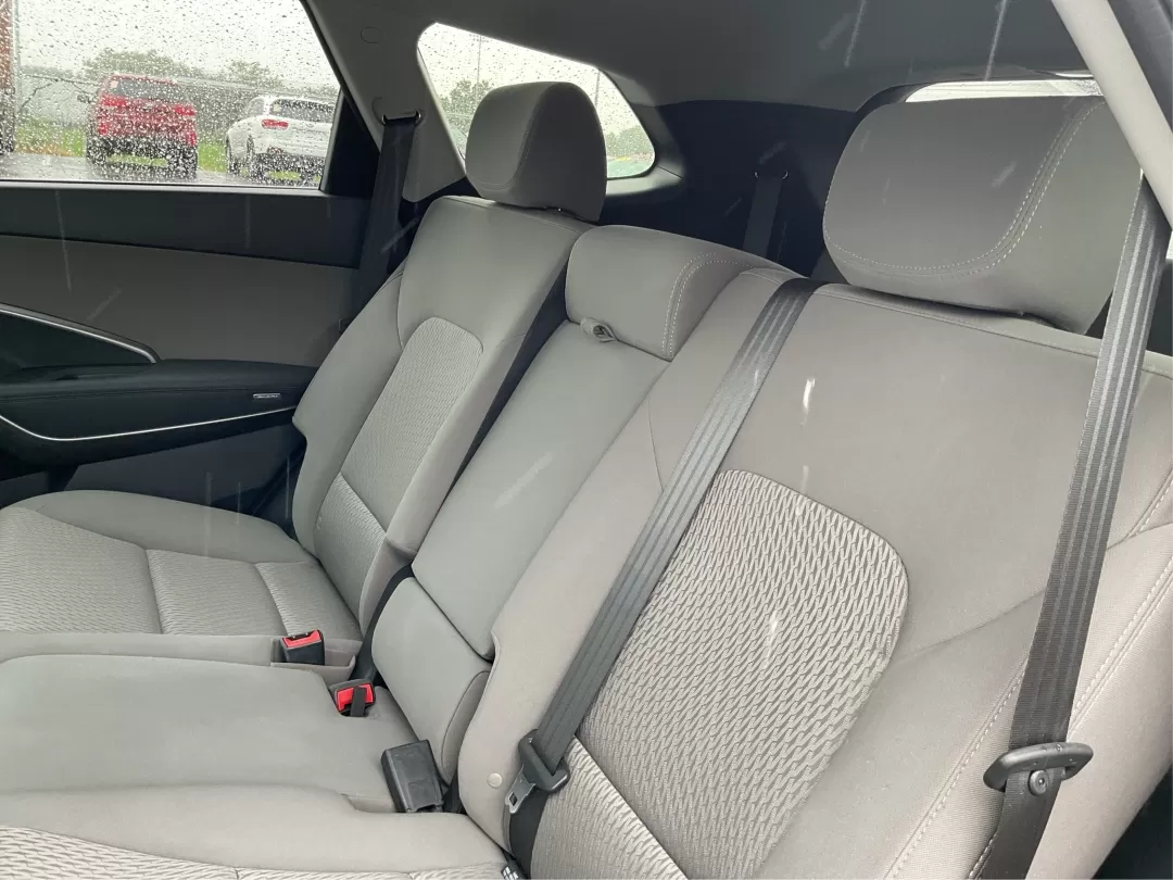 2014 Hyundai Santa Fe GLS (KM8SM4HF5EU) with an Lambda II 3.3L V-6 gasoline direct injection engine, located at 8750 N County Rd 25A, Piqua, OH, 45356, (937) 908-9800, 40.164391, -84.232513 - Looking for the perfect SUV to complement your busy lifestyle? Look no further than the 2014 Hyundai Santa Fe GLS, a vehicle designed for families, adventurers, and commuters alike. This reliable SUV, available at Advantage Car and Credit in Fairborn, OH, provides ample space, comfort, and modern fe - Photo#9