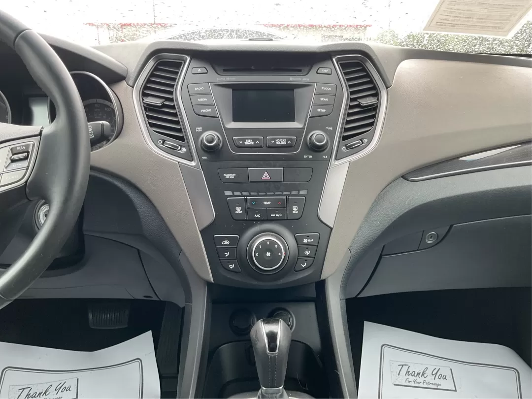 2014 Hyundai Santa Fe GLS (KM8SM4HF5EU) with an Lambda II 3.3L V-6 gasoline direct injection engine, located at 8750 N County Rd 25A, Piqua, OH, 45356, (937) 908-9800, 40.164391, -84.232513 - Looking for the perfect SUV to complement your busy lifestyle? Look no further than the 2014 Hyundai Santa Fe GLS, a vehicle designed for families, adventurers, and commuters alike. This reliable SUV, available at Advantage Car and Credit in Fairborn, OH, provides ample space, comfort, and modern fe - Photo#12