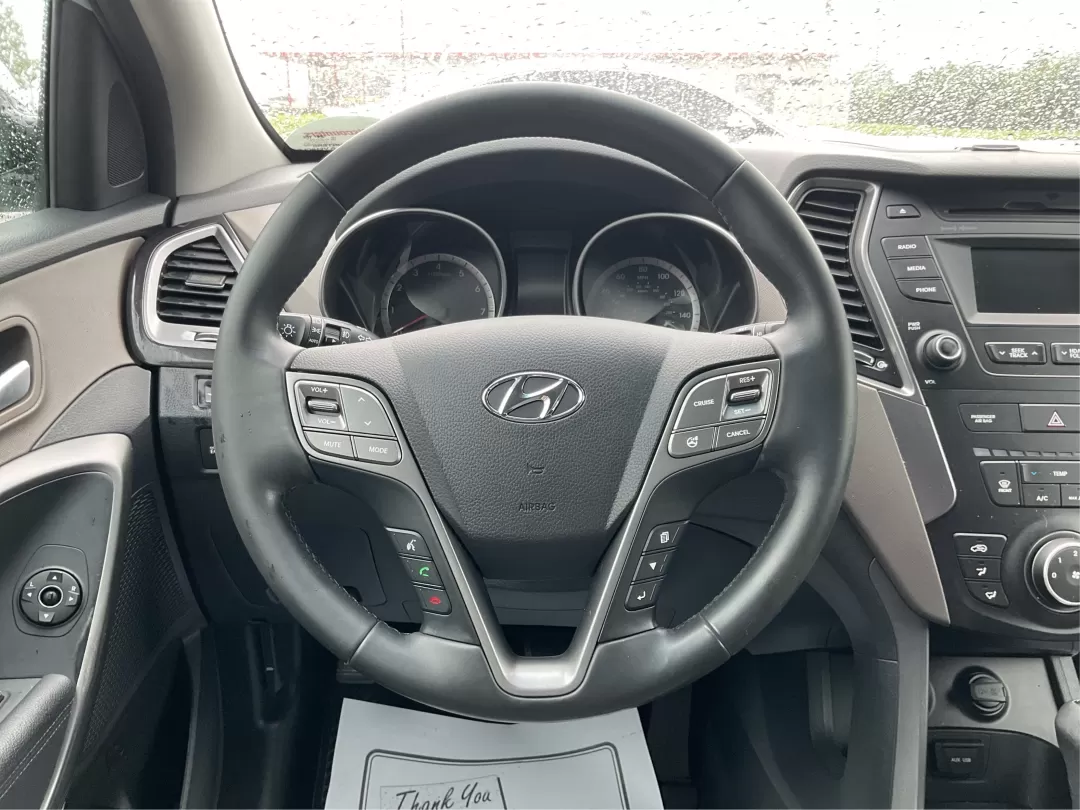 2014 Hyundai Santa Fe GLS (KM8SM4HF5EU) with an Lambda II 3.3L V-6 gasoline direct injection engine, located at 8750 N County Rd 25A, Piqua, OH, 45356, (937) 908-9800, 40.164391, -84.232513 - Looking for the perfect SUV to complement your busy lifestyle? Look no further than the 2014 Hyundai Santa Fe GLS, a vehicle designed for families, adventurers, and commuters alike. This reliable SUV, available at Advantage Car and Credit in Fairborn, OH, provides ample space, comfort, and modern fe - Photo#15