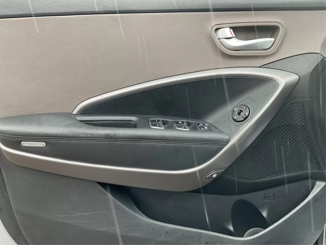 2014 Hyundai Santa Fe GLS (KM8SM4HF5EU) with an Lambda II 3.3L V-6 gasoline direct injection engine, located at 8750 N County Rd 25A, Piqua, OH, 45356, (937) 908-9800, 40.164391, -84.232513 - Looking for the perfect SUV to complement your busy lifestyle? Look no further than the 2014 Hyundai Santa Fe GLS, a vehicle designed for families, adventurers, and commuters alike. This reliable SUV, available at Advantage Car and Credit in Fairborn, OH, provides ample space, comfort, and modern fe - Photo#17