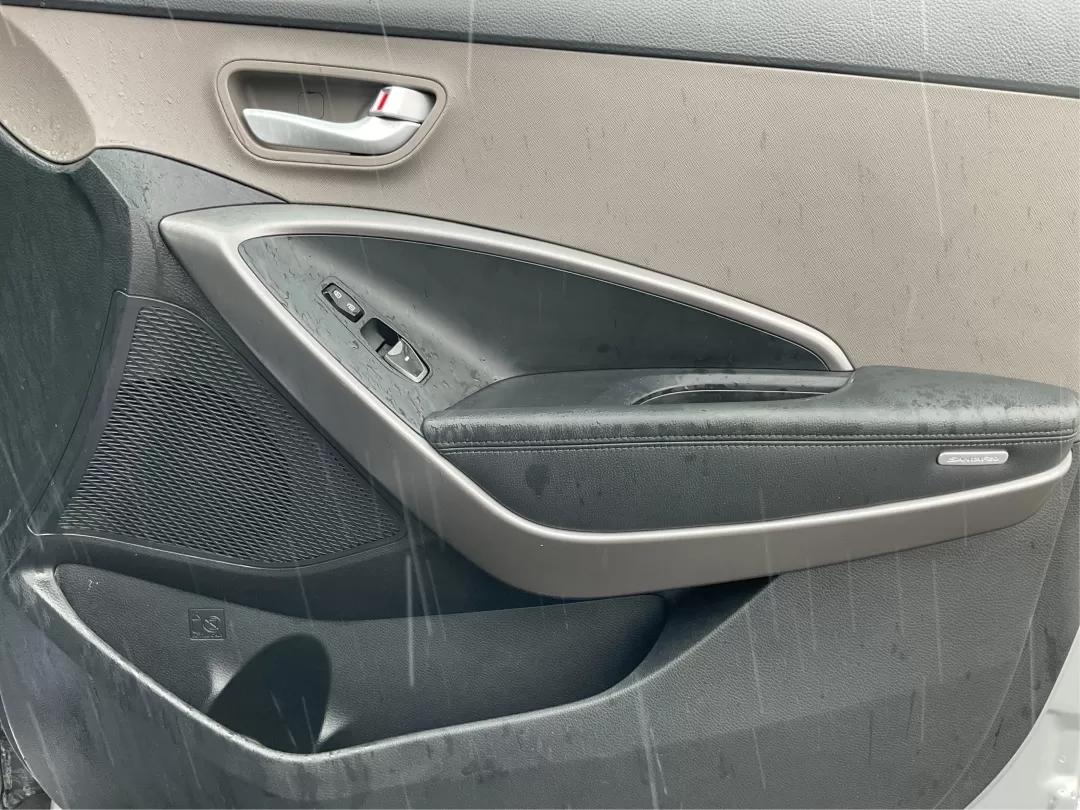 2014 Hyundai Santa Fe GLS (KM8SM4HF5EU) with an Lambda II 3.3L V-6 gasoline direct injection engine, located at 8750 N County Rd 25A, Piqua, OH, 45356, (937) 908-9800, 40.164391, -84.232513 - Looking for the perfect SUV to complement your busy lifestyle? Look no further than the 2014 Hyundai Santa Fe GLS, a vehicle designed for families, adventurers, and commuters alike. This reliable SUV, available at Advantage Car and Credit in Fairborn, OH, provides ample space, comfort, and modern fe - Photo#18