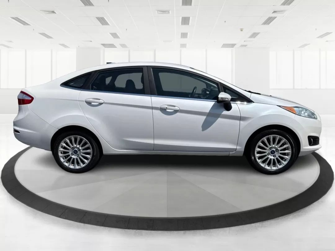 2016 Ford Fiesta Titanium (3FADP4CJ9GM) with an 1.6L I-4 DOHC engine, located at 880 E. National Road, Vandalia, OH, 45377, (937) 908-9800, 39.891918, -84.183594 - Photo#1