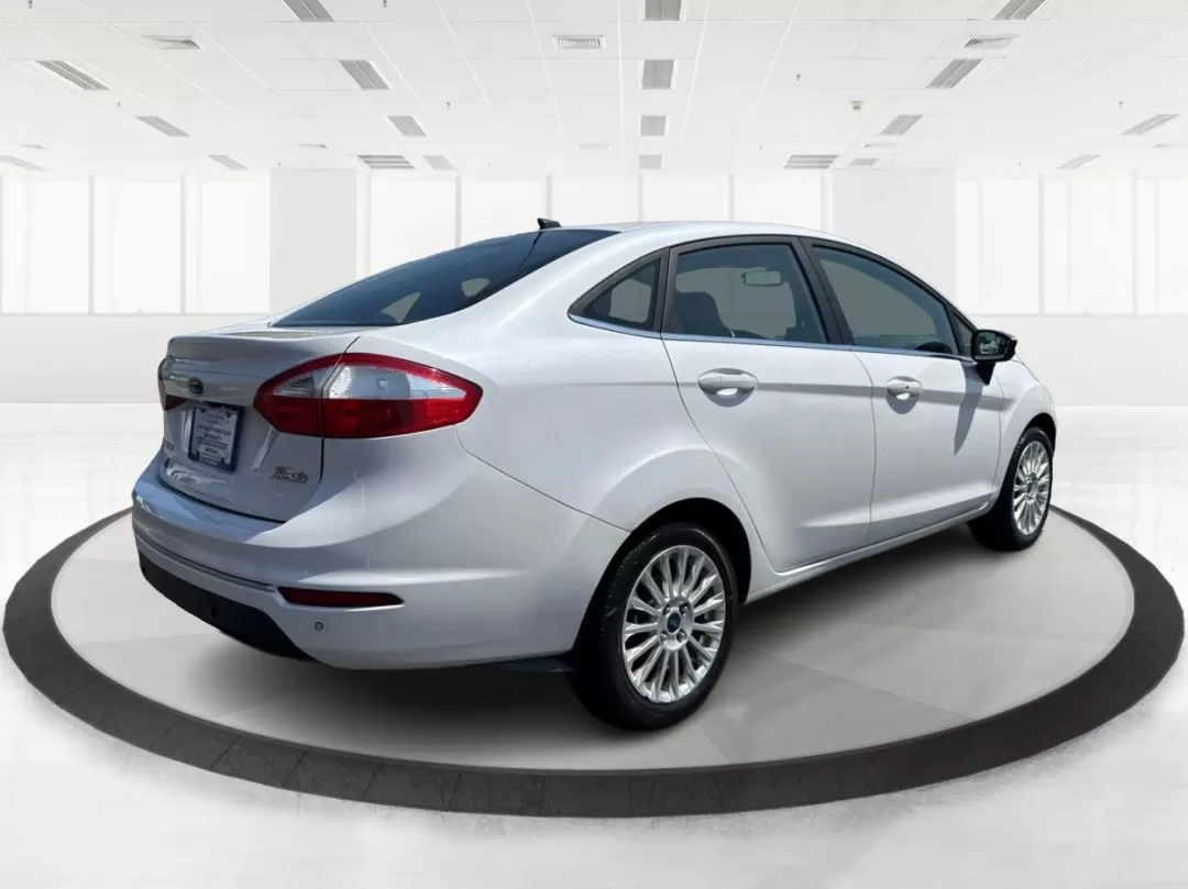 2016 Ford Fiesta Titanium (3FADP4CJ9GM) with an 1.6L I-4 DOHC engine, located at 880 E. National Road, Vandalia, OH, 45377, (937) 908-9800, 39.891918, -84.183594 - Photo#2