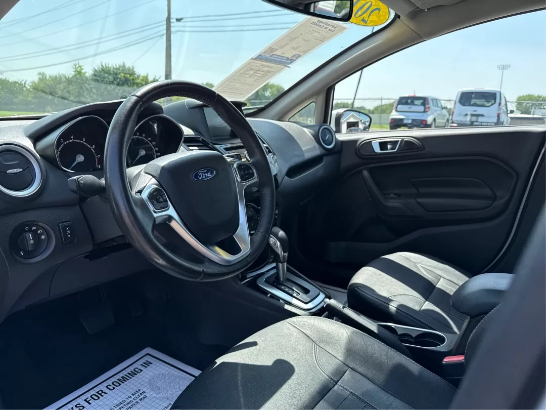 2016 Ford Fiesta Titanium (3FADP4CJ9GM) with an 1.6L I-4 DOHC engine, located at 880 E. National Road, Vandalia, OH, 45377, (937) 908-9800, 39.891918, -84.183594 - Photo#9