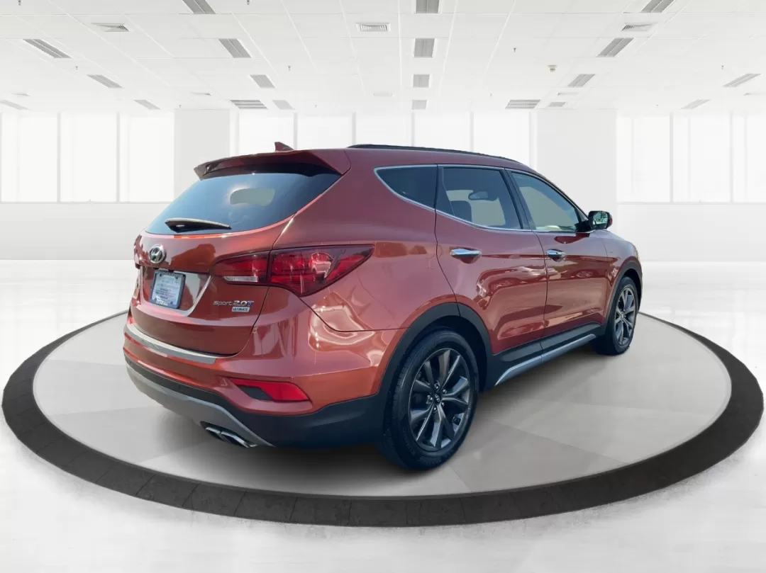 2017 Hyundai Santa Fe 2.0T Ultimate (5XYZW4LA5HG) with an Theta II 2L I-4 gasoline direct injection engine, located at 1184 Kauffman Ave, Fairborn, OH, 45324, (937) 908-9800, 39.807072, -84.030914 - Photo#2