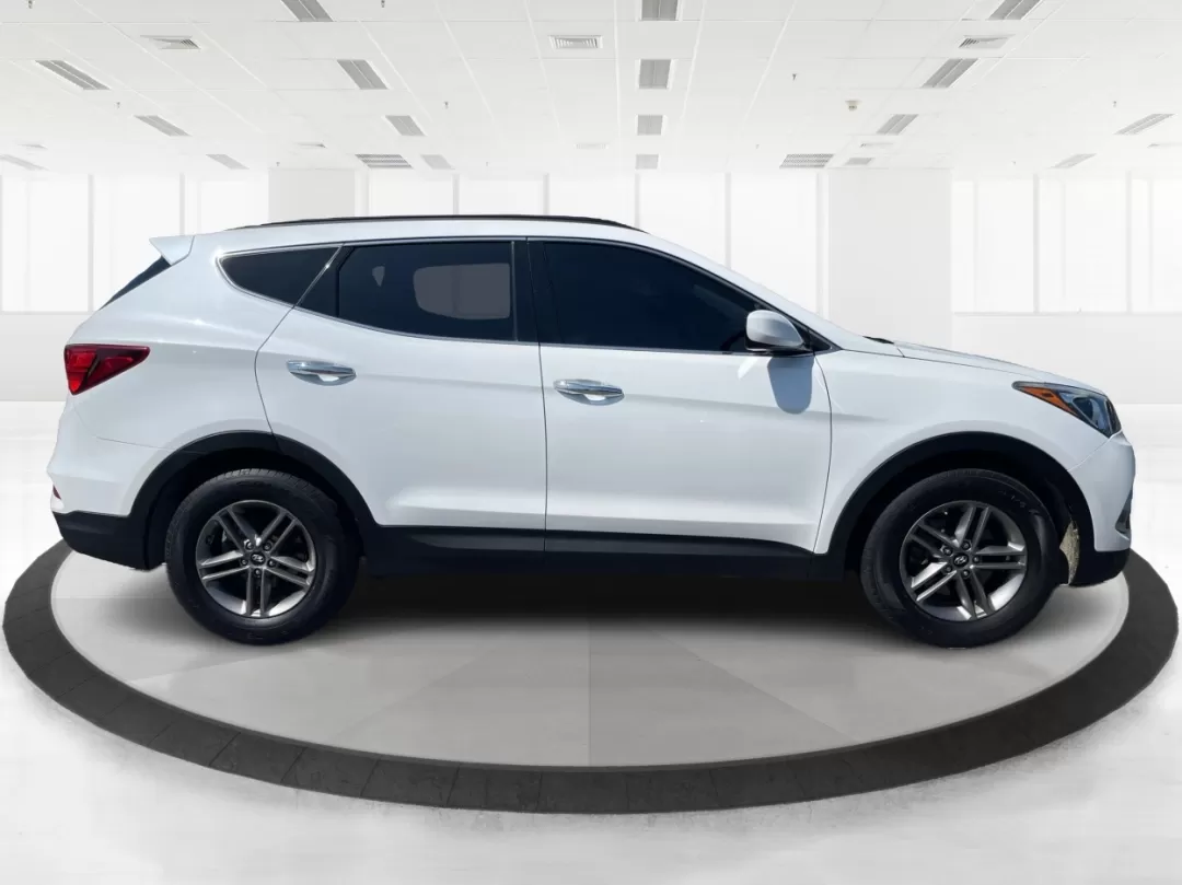 2017 Hyundai Santa Fe 2.4L (5XYZU3LB3HG) with an Theta II 2.4L I-4 gasoline direct injection engine, located at 1230 East Main St, Xenia, OH, 45385, (937) 908-9800, 39.688026, -83.910172 - Photo#1