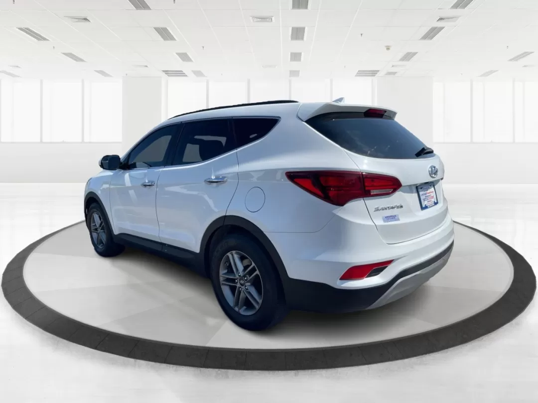 2017 Hyundai Santa Fe 2.4L (5XYZU3LB3HG) with an Theta II 2.4L I-4 gasoline direct injection engine, located at 1230 East Main St, Xenia, OH, 45385, (937) 908-9800, 39.688026, -83.910172 - Photo#4