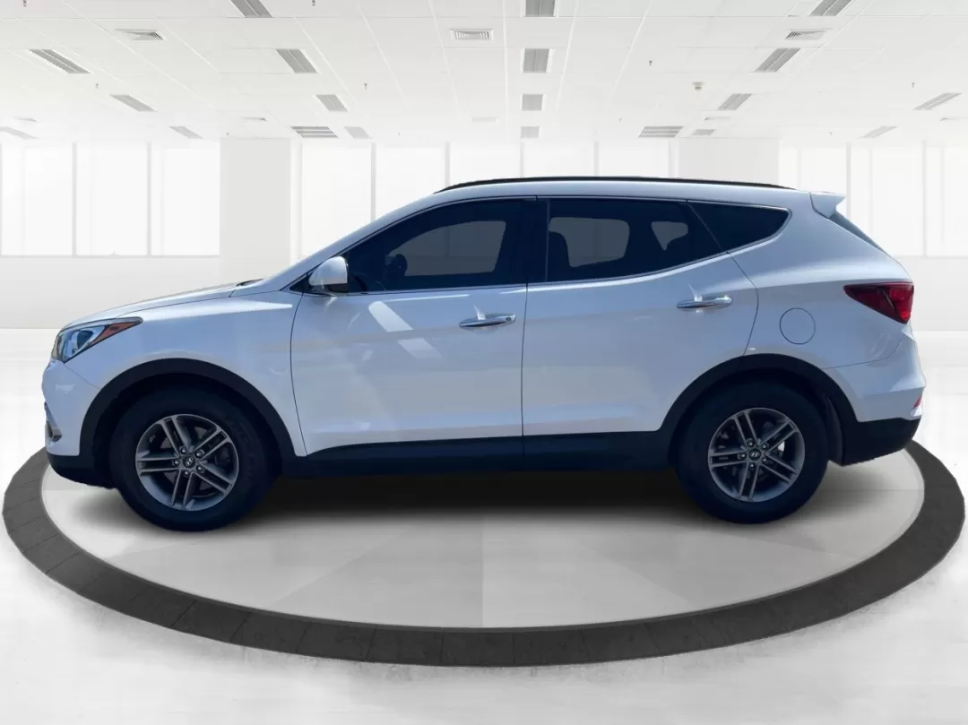 2017 Hyundai Santa Fe 2.4L (5XYZU3LB3HG) with an Theta II 2.4L I-4 gasoline direct injection engine, located at 1230 East Main St, Xenia, OH, 45385, (937) 908-9800, 39.688026, -83.910172 - Photo#5