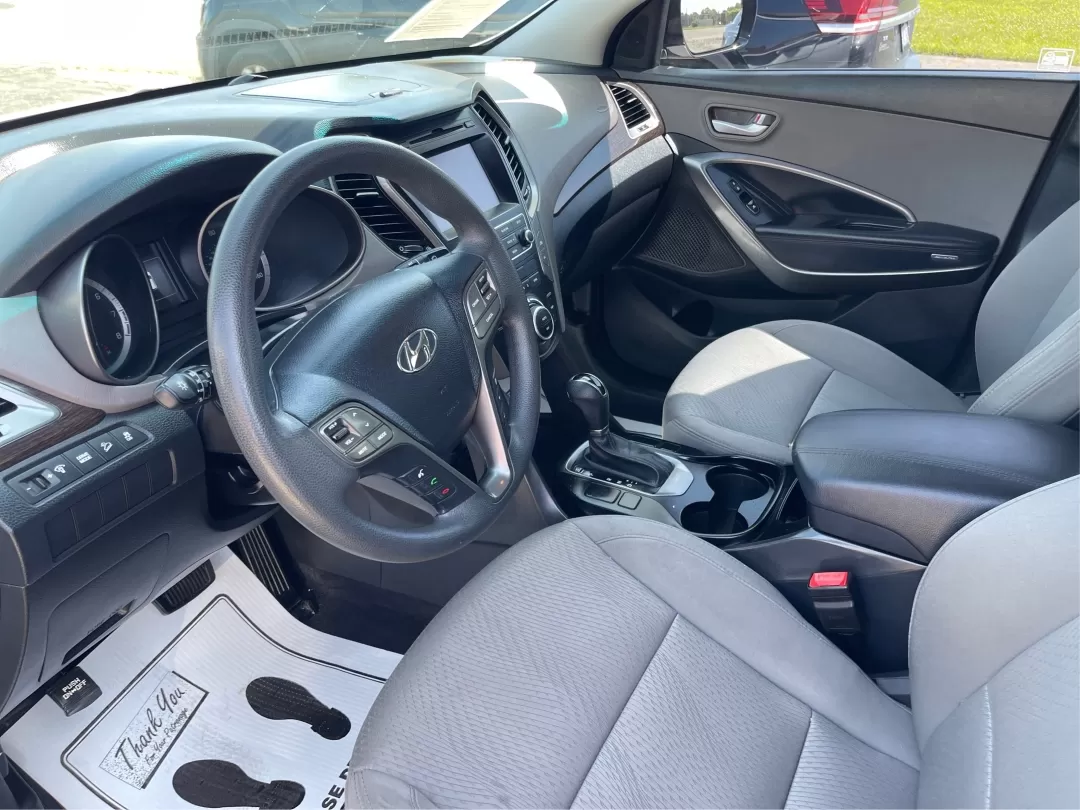 2017 Hyundai Santa Fe 2.4L (5XYZU3LB3HG) with an Theta II 2.4L I-4 gasoline direct injection engine, located at 1230 East Main St, Xenia, OH, 45385, (937) 908-9800, 39.688026, -83.910172 - Photo#9