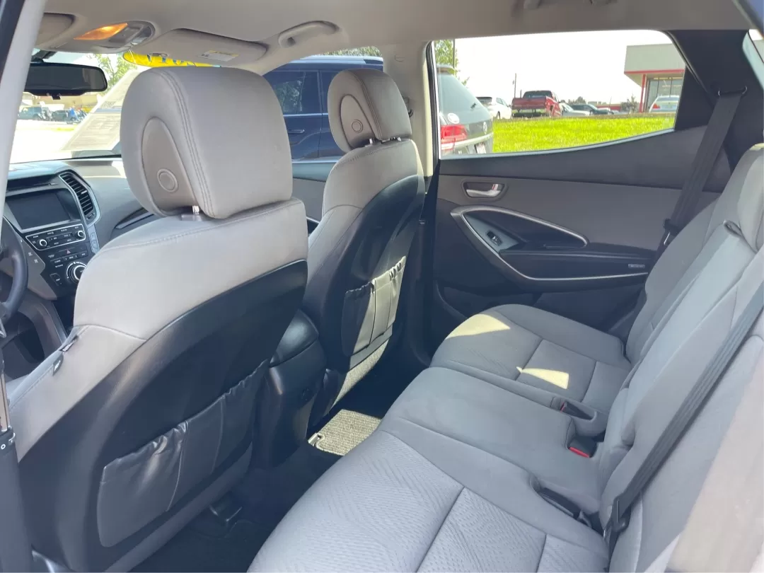 2017 Hyundai Santa Fe 2.4L (5XYZU3LB3HG) with an Theta II 2.4L I-4 gasoline direct injection engine, located at 1230 East Main St, Xenia, OH, 45385, (937) 908-9800, 39.688026, -83.910172 - Photo#10