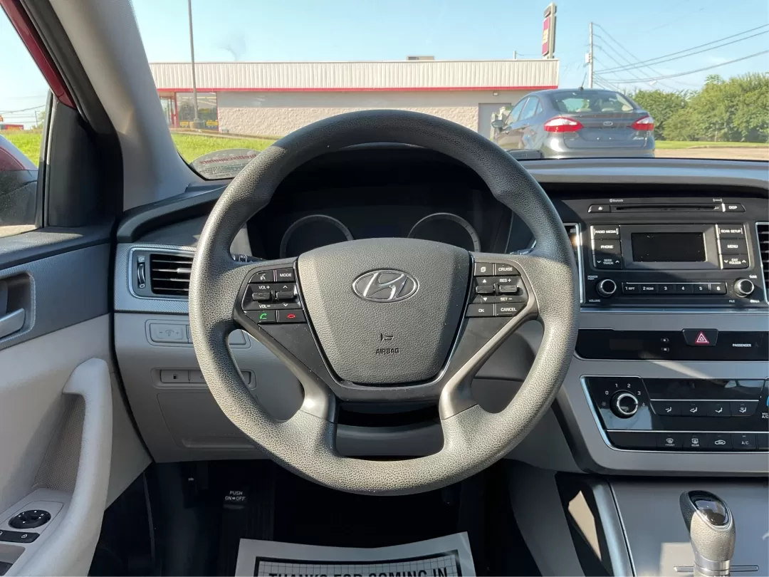 2015 Hyundai Sonata SE (5NPE24AFXFH) with an 2.4L I-4 gasoline direct injection engine, located at 1099 N County Rd 25A , Troy, OH, 45373, (937) 908-9800, 40.057079, -84.212883 - Discover the perfect balance of style, comfort, and reliability with the 2015 Hyundai Sonata SE, available now at Advantage Car and Credit in Fairborn, OH. Whether you're commuting to work, running errands in the nearby neighborhoods of Wright-Patterson Air Force Base, or heading out for a weekend a - Photo#16